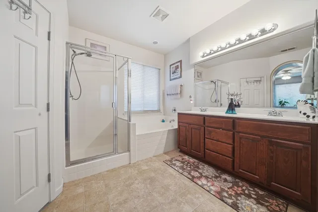 a bed room with a bed and a couch