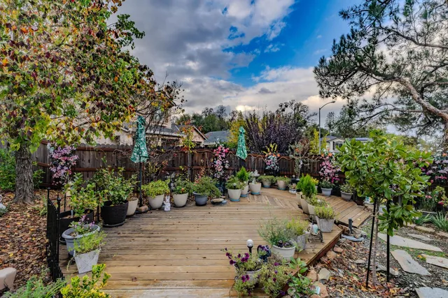 an aerial view of a house with a garden