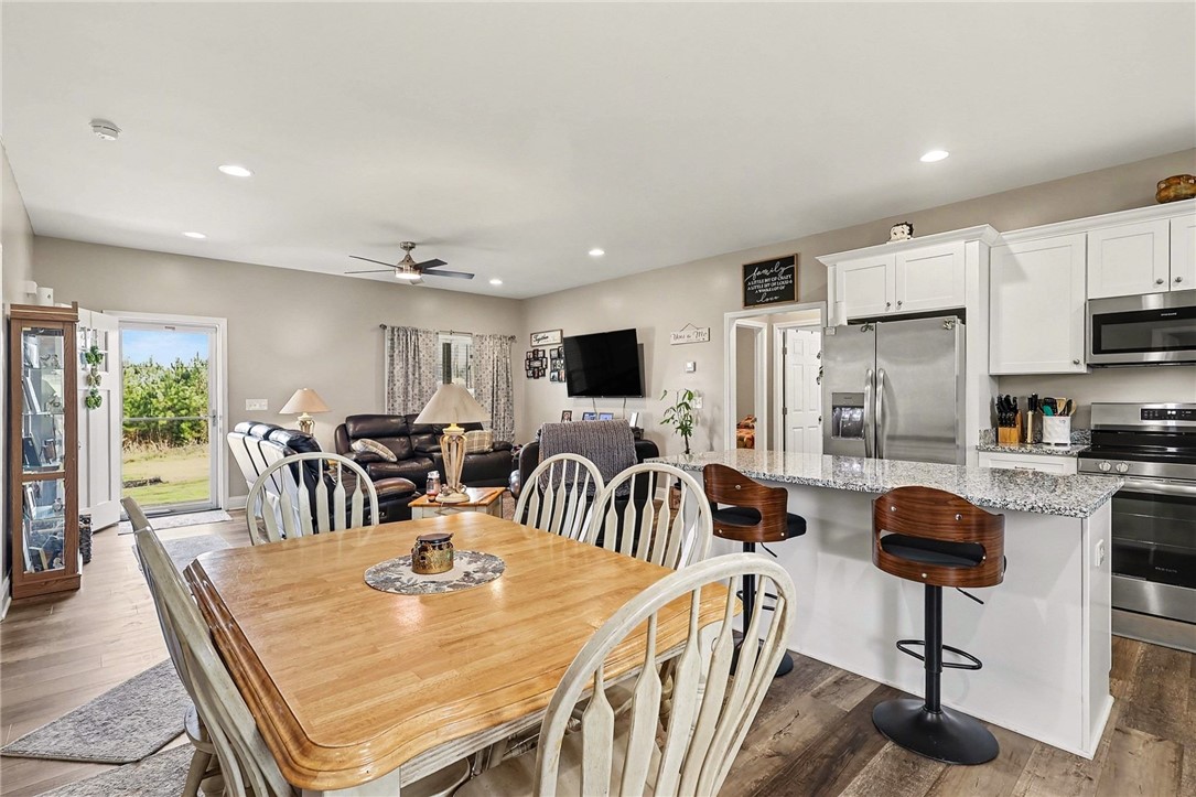508 Rice Park Drive Anderson, SC 29621 - Photo 12 of 25 This inviting space combines a functional kitchen with a cozy living area, perfect for daily life.
