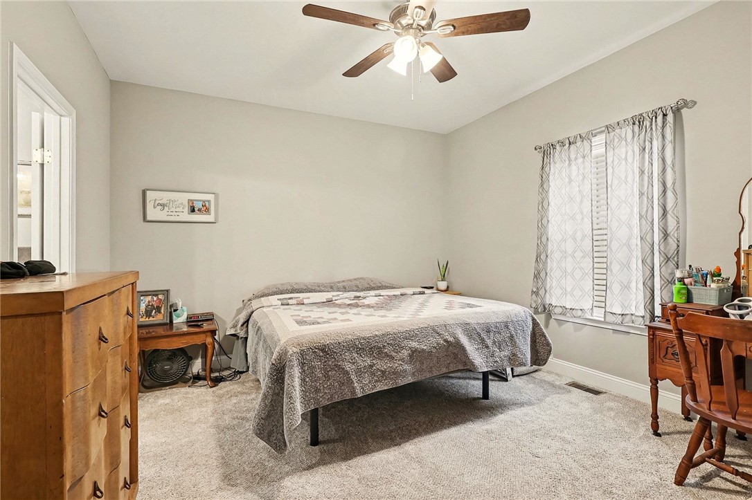 508 Rice Park Drive Anderson, SC 29621 - Photo 14 of 25 This cozy bedroom provides a comfortable retreat with soft carpet and a window offering natural light.