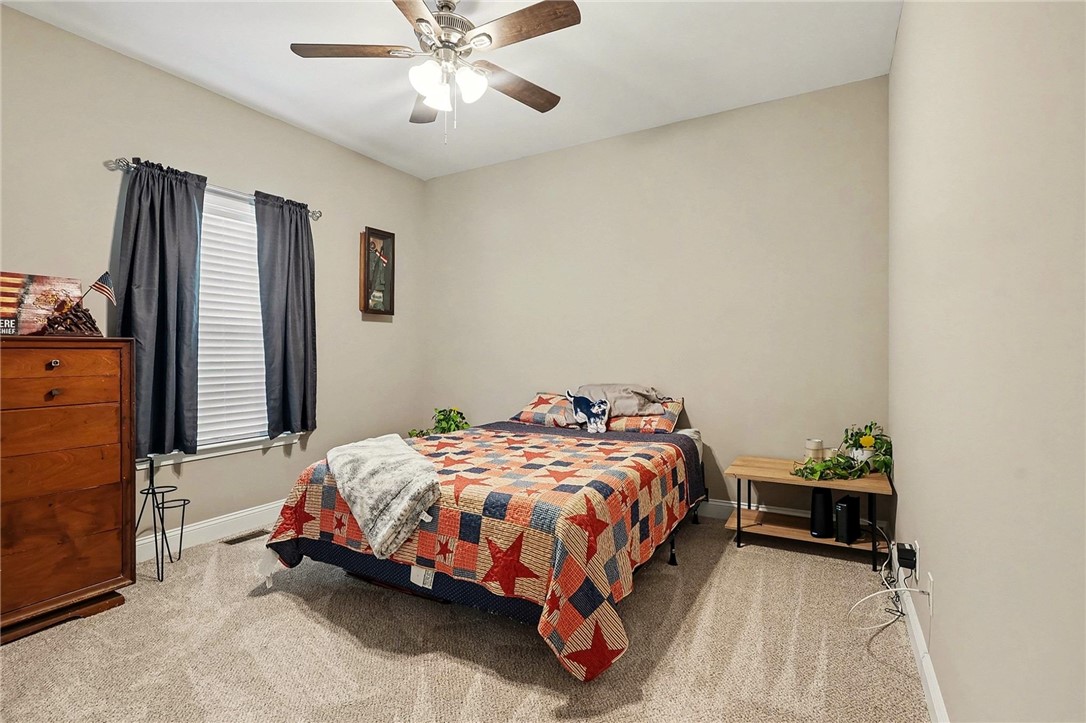 508 Rice Park Drive Anderson, SC 29621 - Photo 18 of 25 This cozy bedroom offers a tranquil retreat for rest and relaxation.