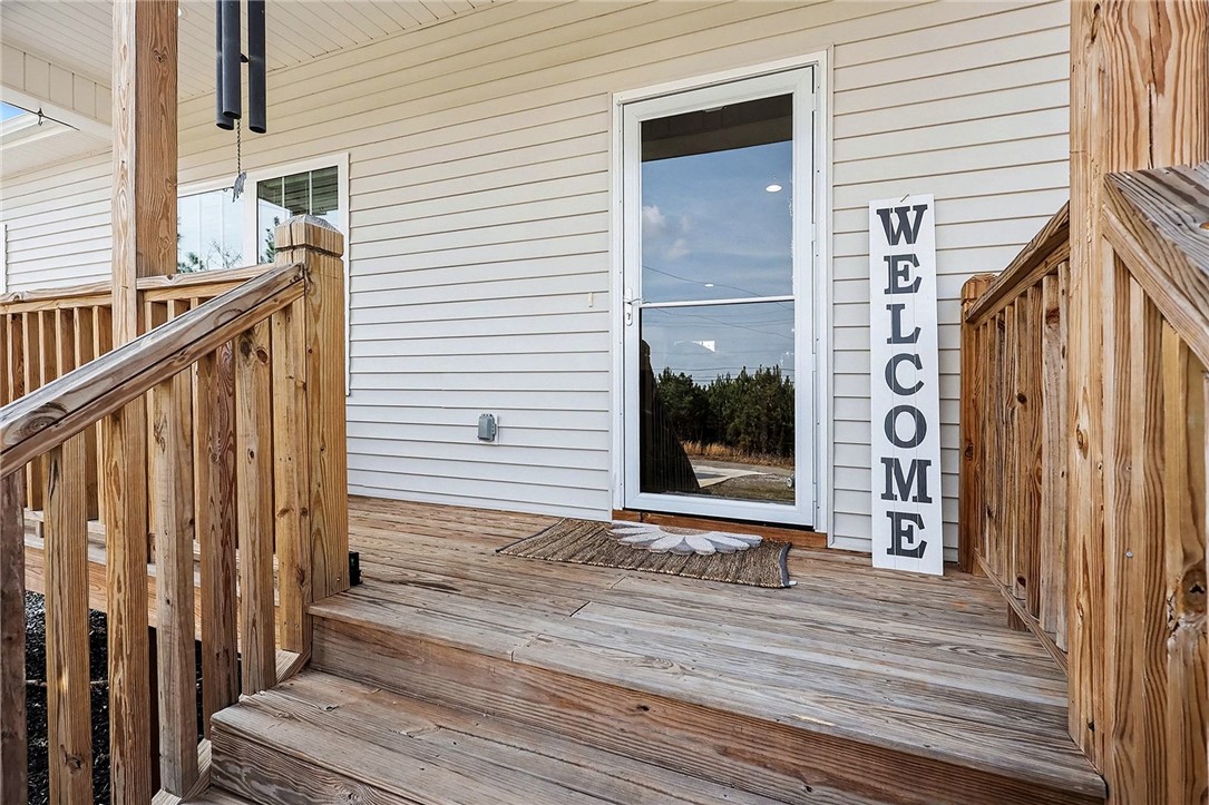 508 Rice Park Drive Anderson, SC 29621 - Photo 2 of 25 This charming front porch features natural wood steps and railings, inviting you to the entrance.