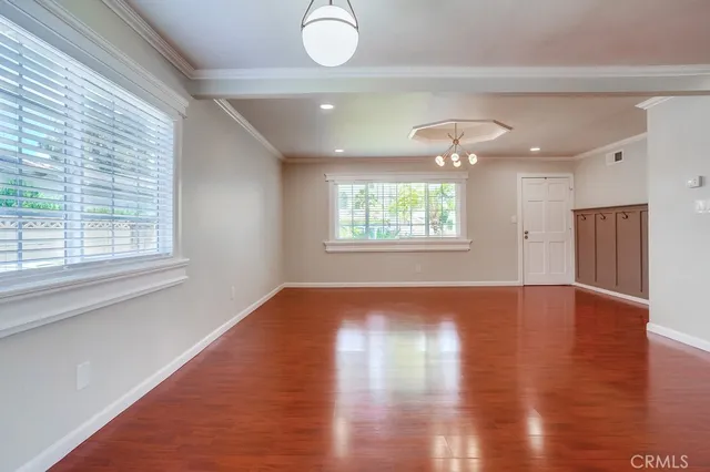 a kitchen with granite countertop cabinets stainless steel appliances and a sink