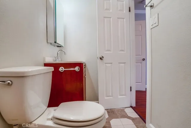a bathroom with a toilet and a sink