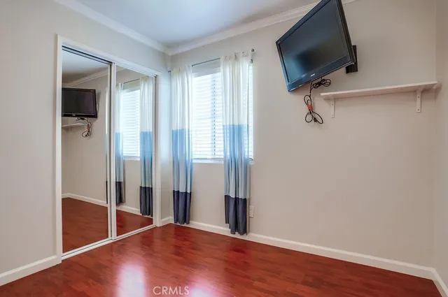 a view of a backyard with a garden and entertaining space