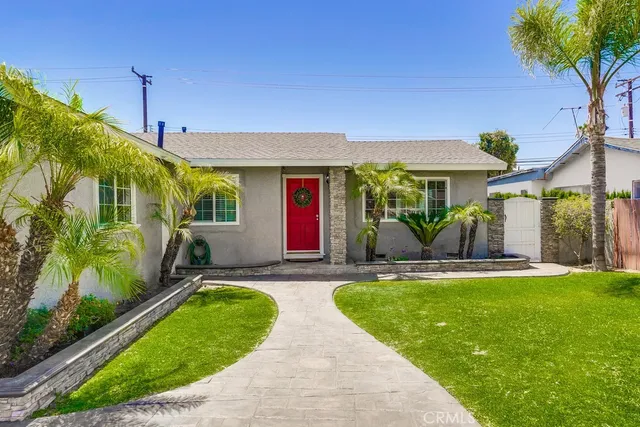 a view of a kitchen with wooden floor and a kitchen space