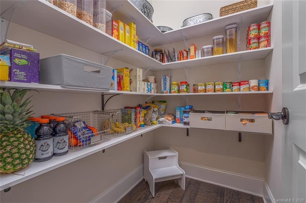 1497 Afton Way Fort Mill, SC 29708 - Photo 14 of 48 a room with lots of furniture and clutter