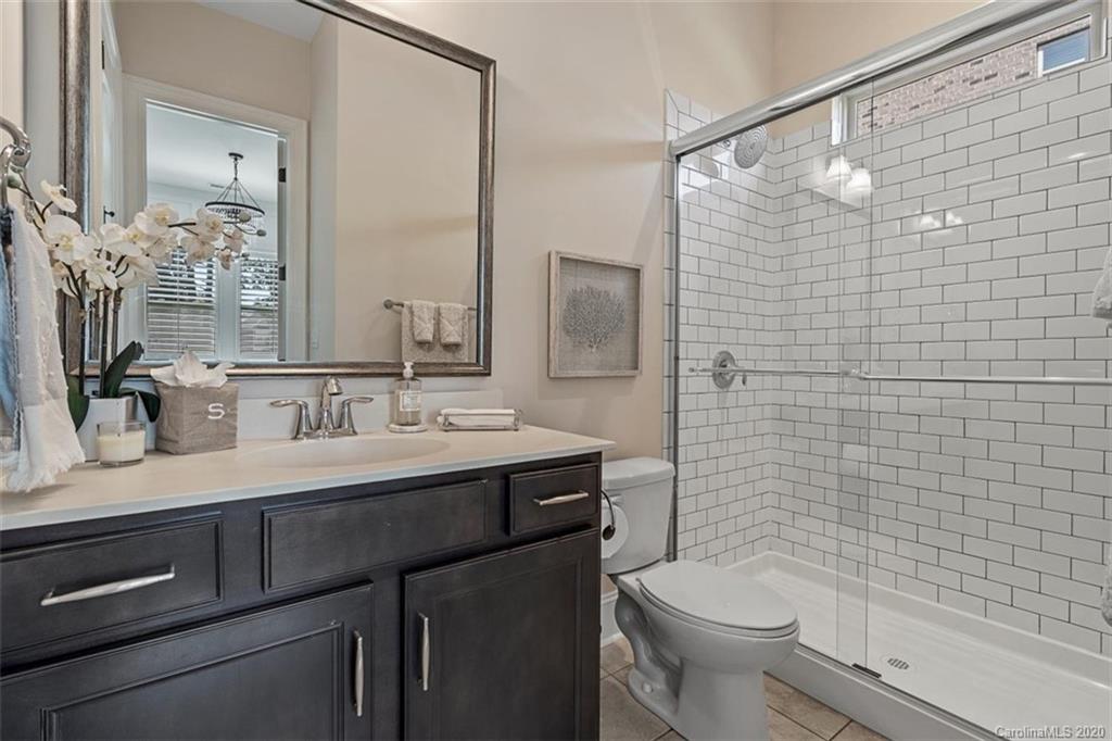 1497 Afton Way Fort Mill, SC 29708 - Photo 22 of 48 a bathroom with a sink a toilet and shower