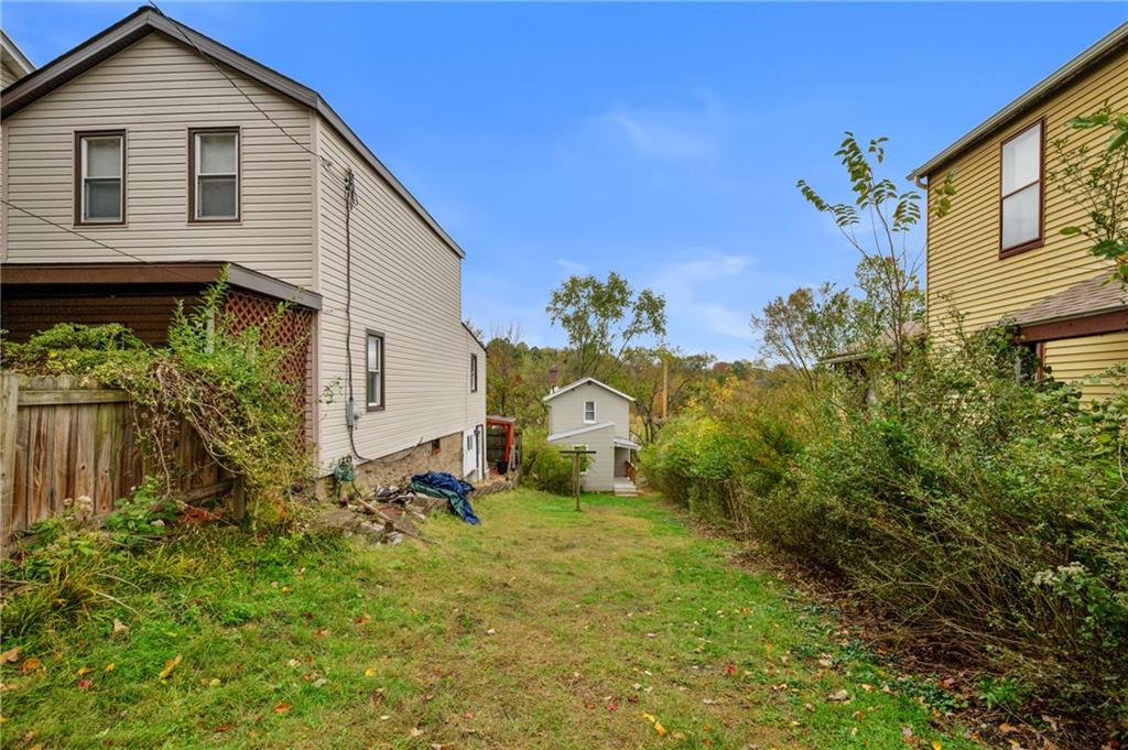 701 Maple Way Oakmont, PA 15139 - Photo 18 of 26 a view of a house with a yard