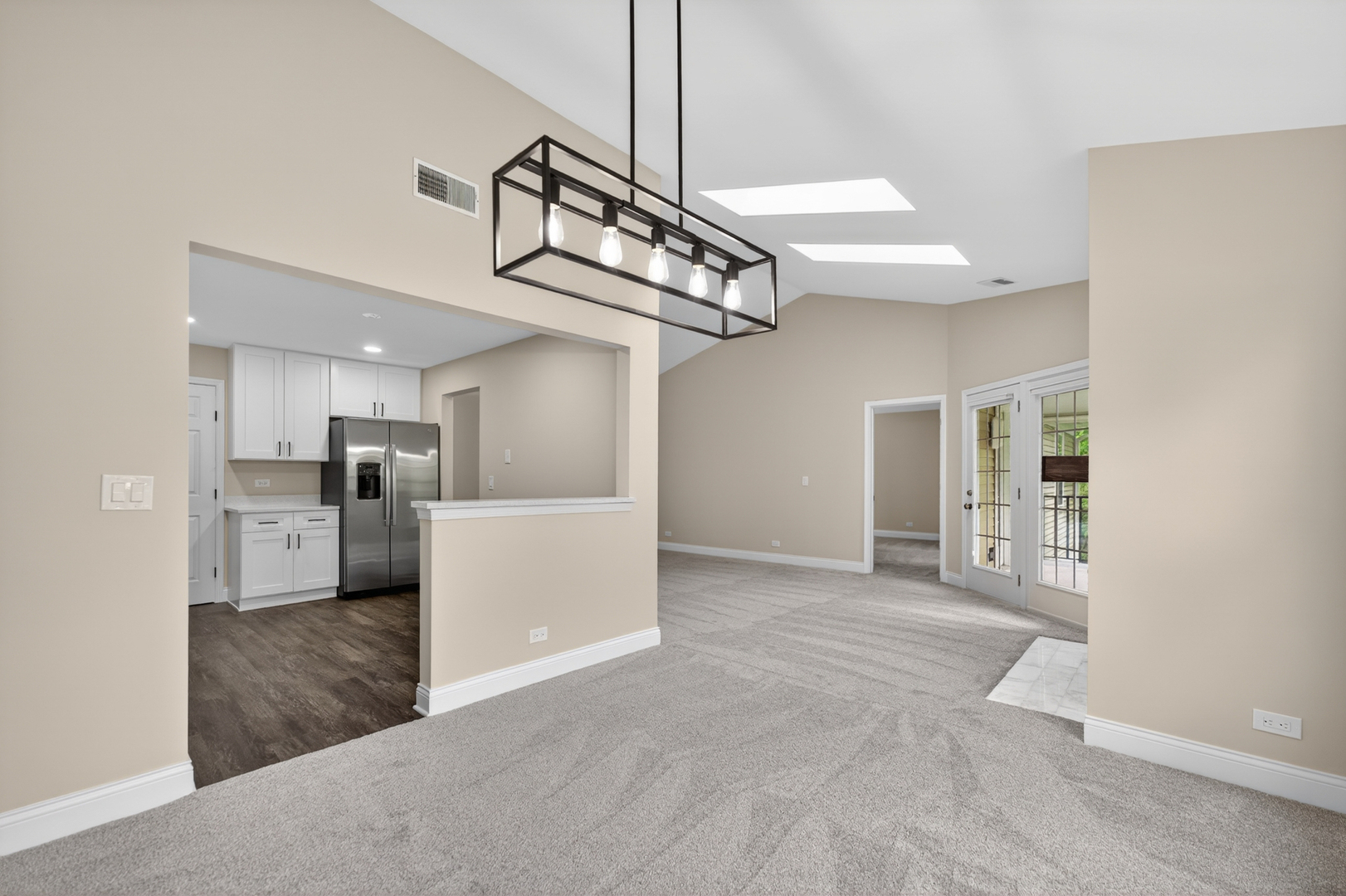 802 Butternut Lane, Unit C Mount Prospect, IL 60056 - Photo 11 of 36 a view of a kitchen with a sink stainless steel appliances and cabinets
