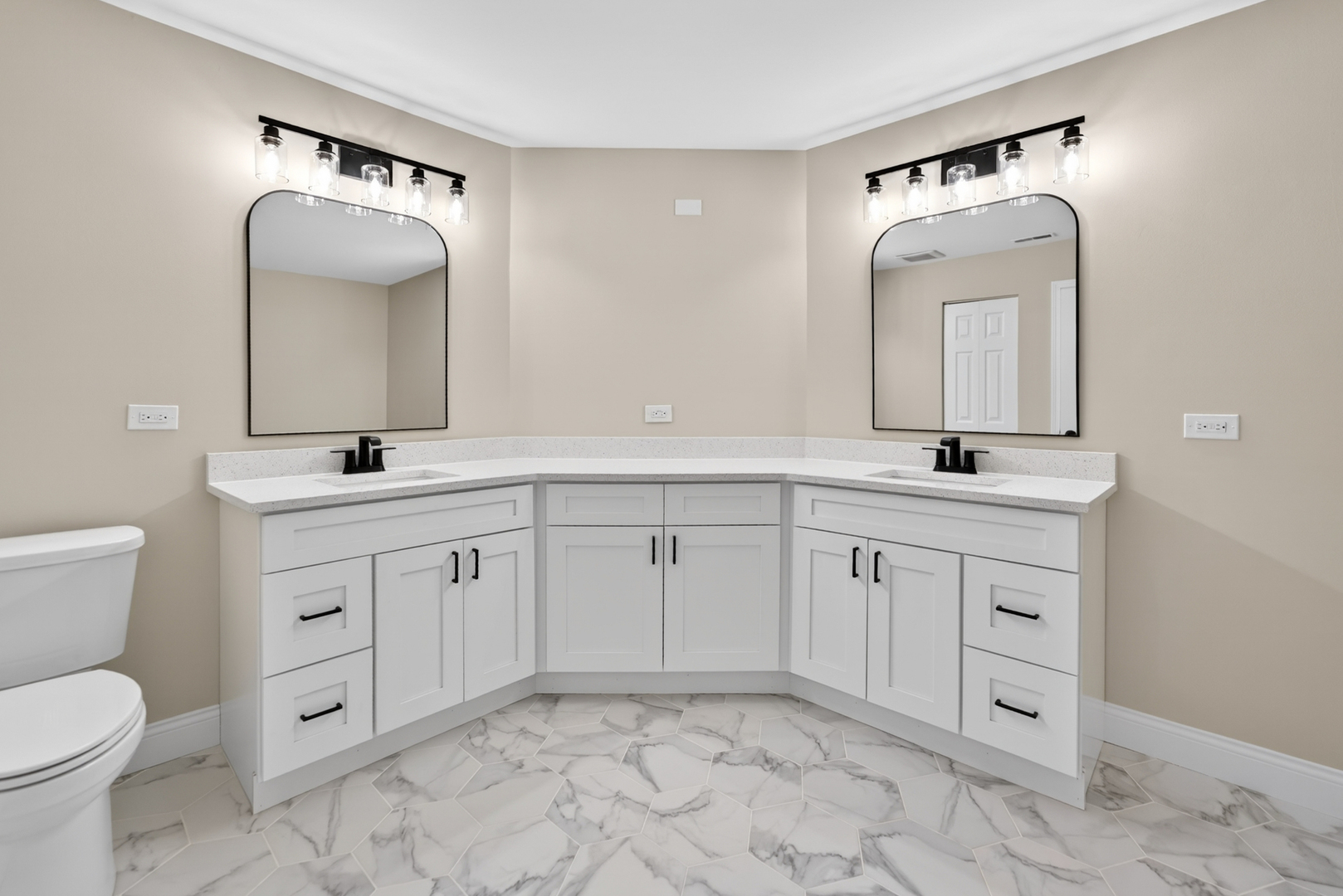 802 Butternut Lane, Unit C Mount Prospect, IL 60056 - Photo 15 of 36 a bathroom with a toilet sink and mirror