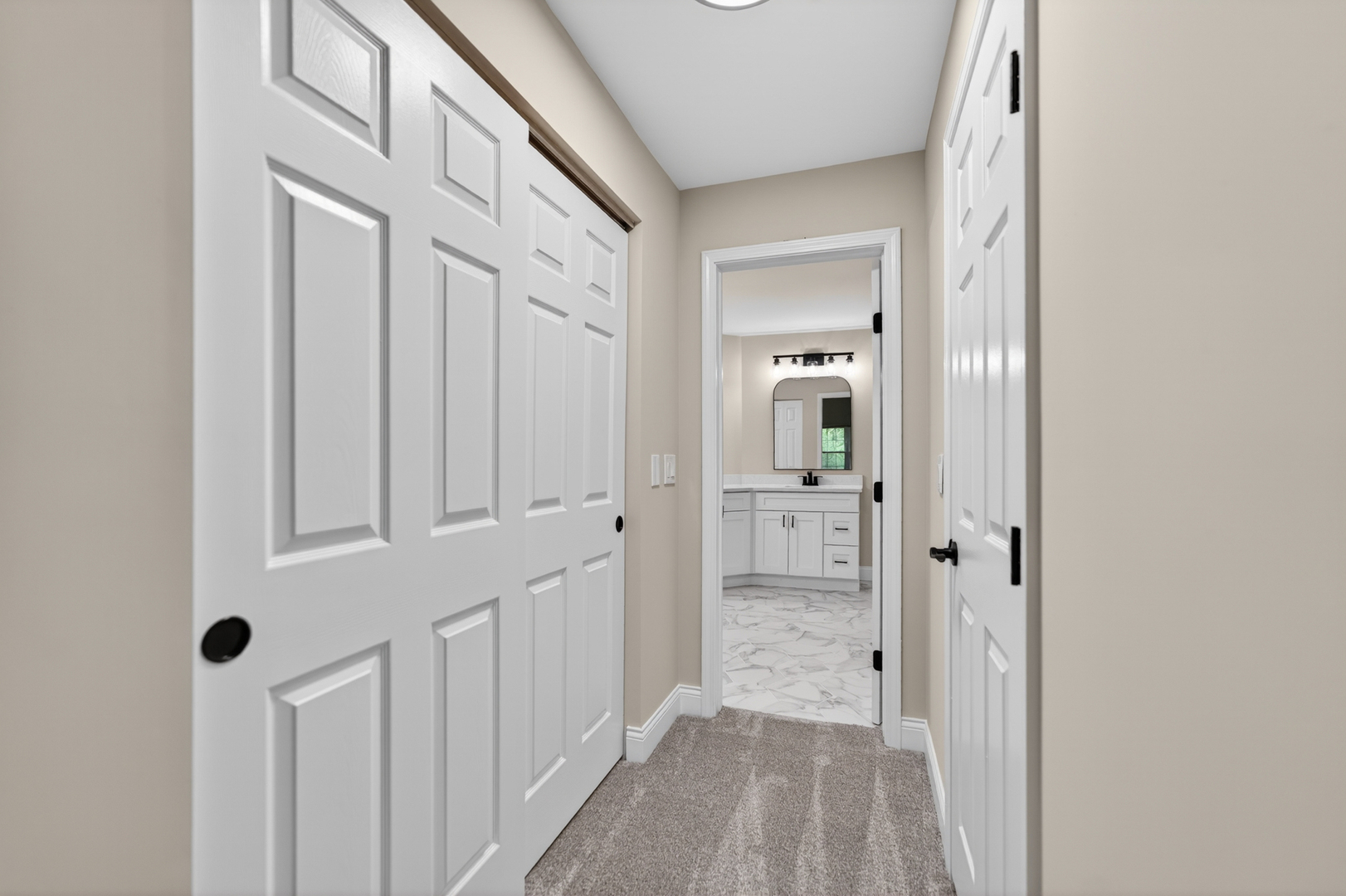 802 Butternut Lane, Unit C Mount Prospect, IL 60056 - Photo 25 of 36 a view of a hallway with a wooden door