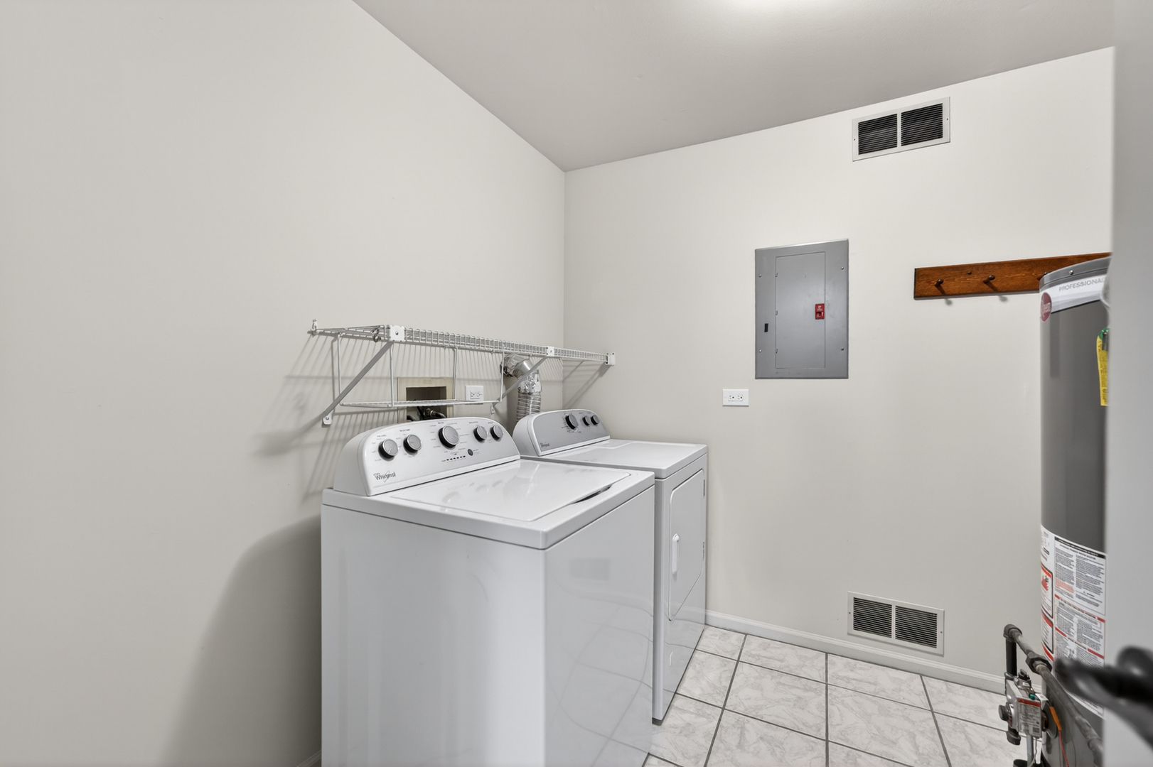 802 Butternut Lane, Unit C Mount Prospect, IL 60056 - Photo 31 of 36 a utility room with dryer and washer