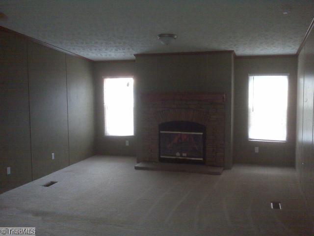 700 Ashland Road Pelham, NC 27311 - Photo 5 of 7 Den/Family/Great Room.