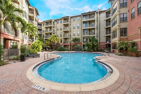 a view of an buildings with swimming pool