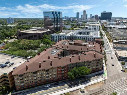an aerial view of a city with lake view