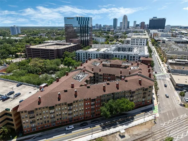 an aerial view of a city with lake view