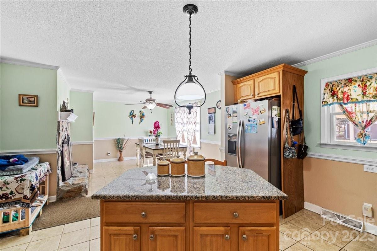 1429 Ebinport Road Rock Hill, SC 29732 - Photo 12 of 30 a kitchen with granite countertop a sink cabinets and stainless steel appliances