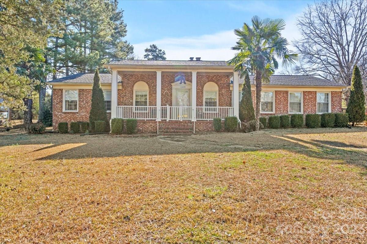 1429 Ebinport Road Rock Hill, SC 29732 - Photo 2 of 30 a front view of a house with a yard