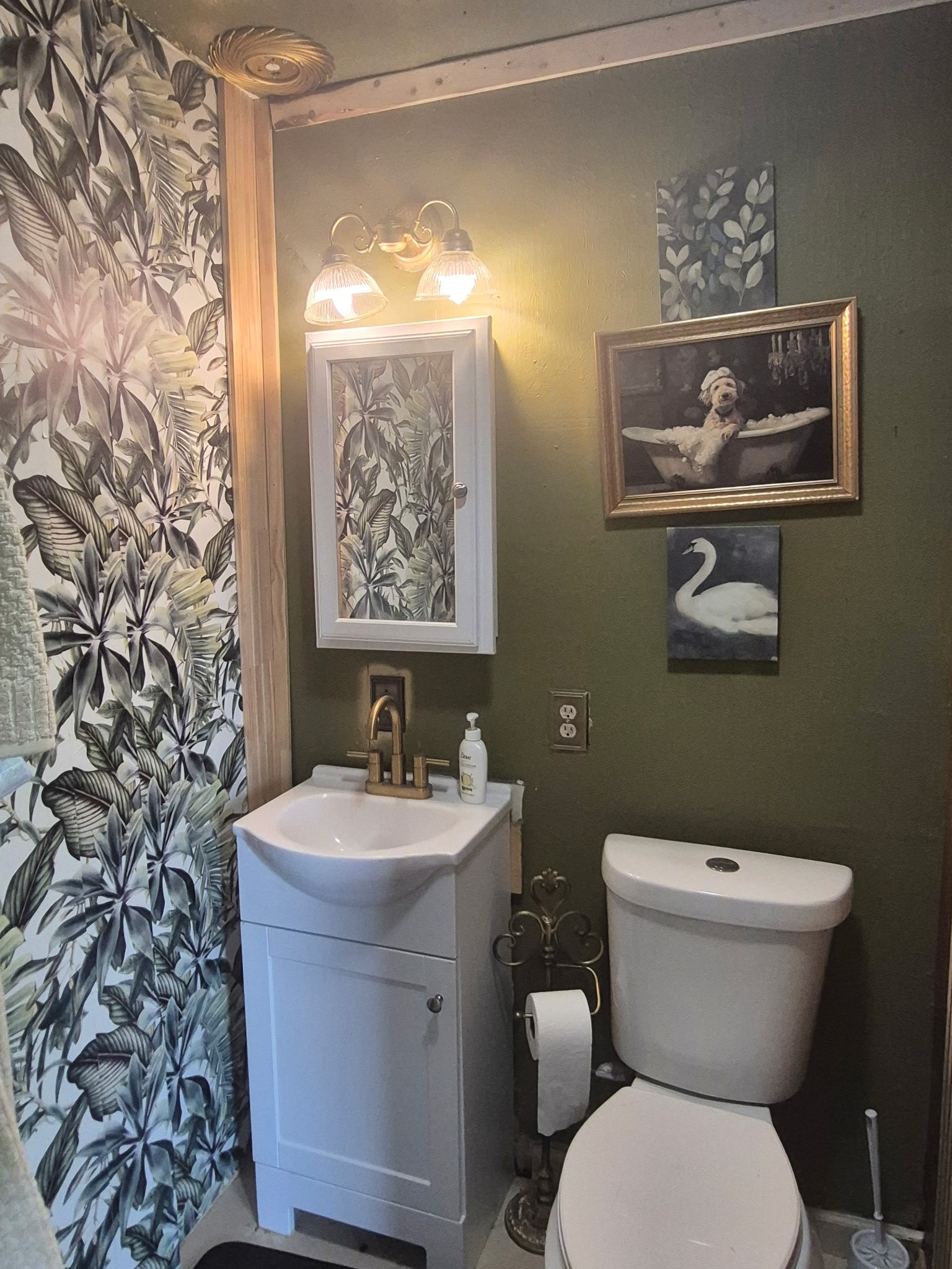 2503 River Crest, Unit 1 Houston, TX 77338 - Photo 11 of 23 a bathroom with a toilet a sink and mirror