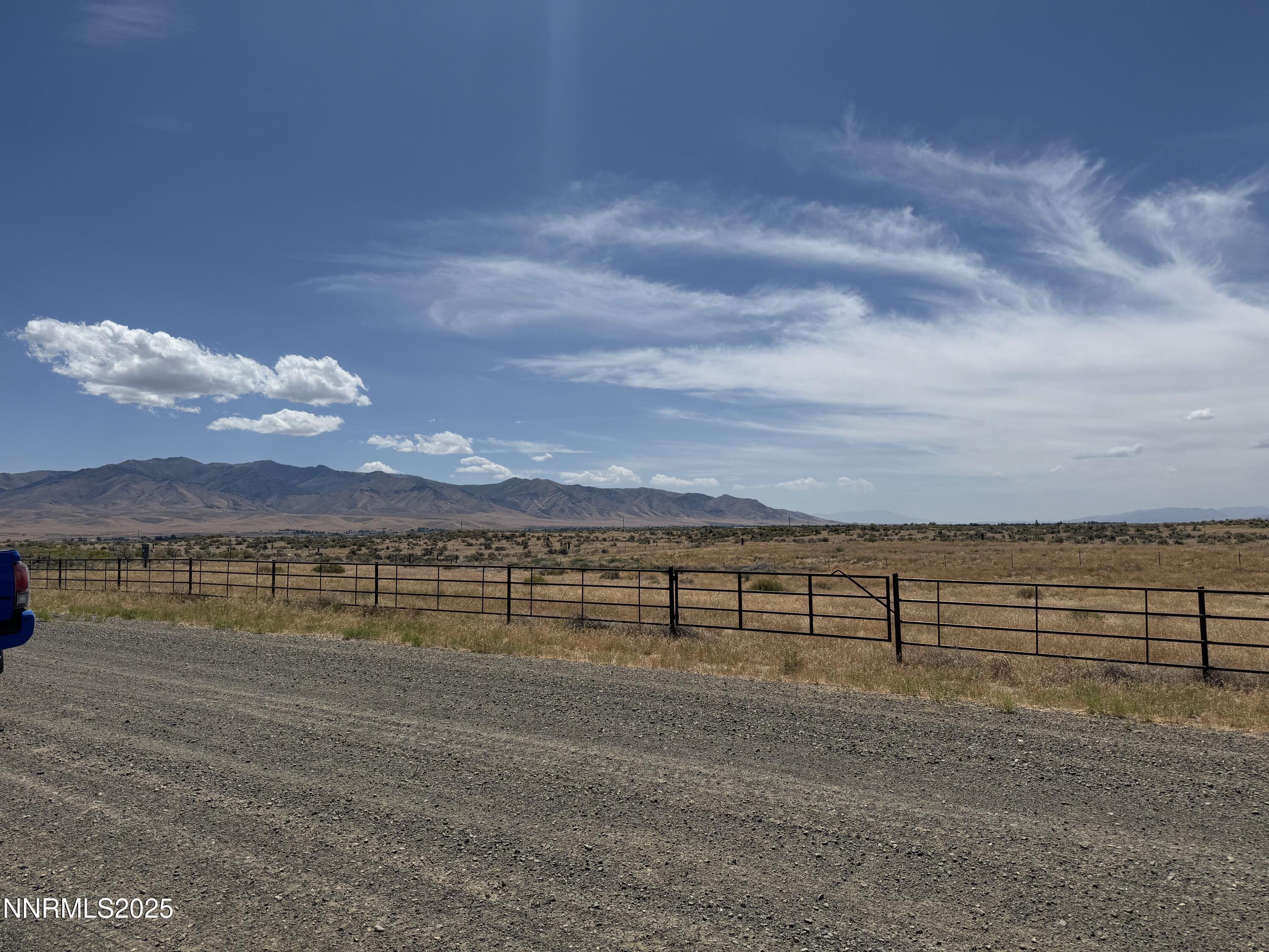 6665 Country Road, Unit 18 Winnemucca, NV 89445 - Photo 3 of 5 a view of an ocean and mountain