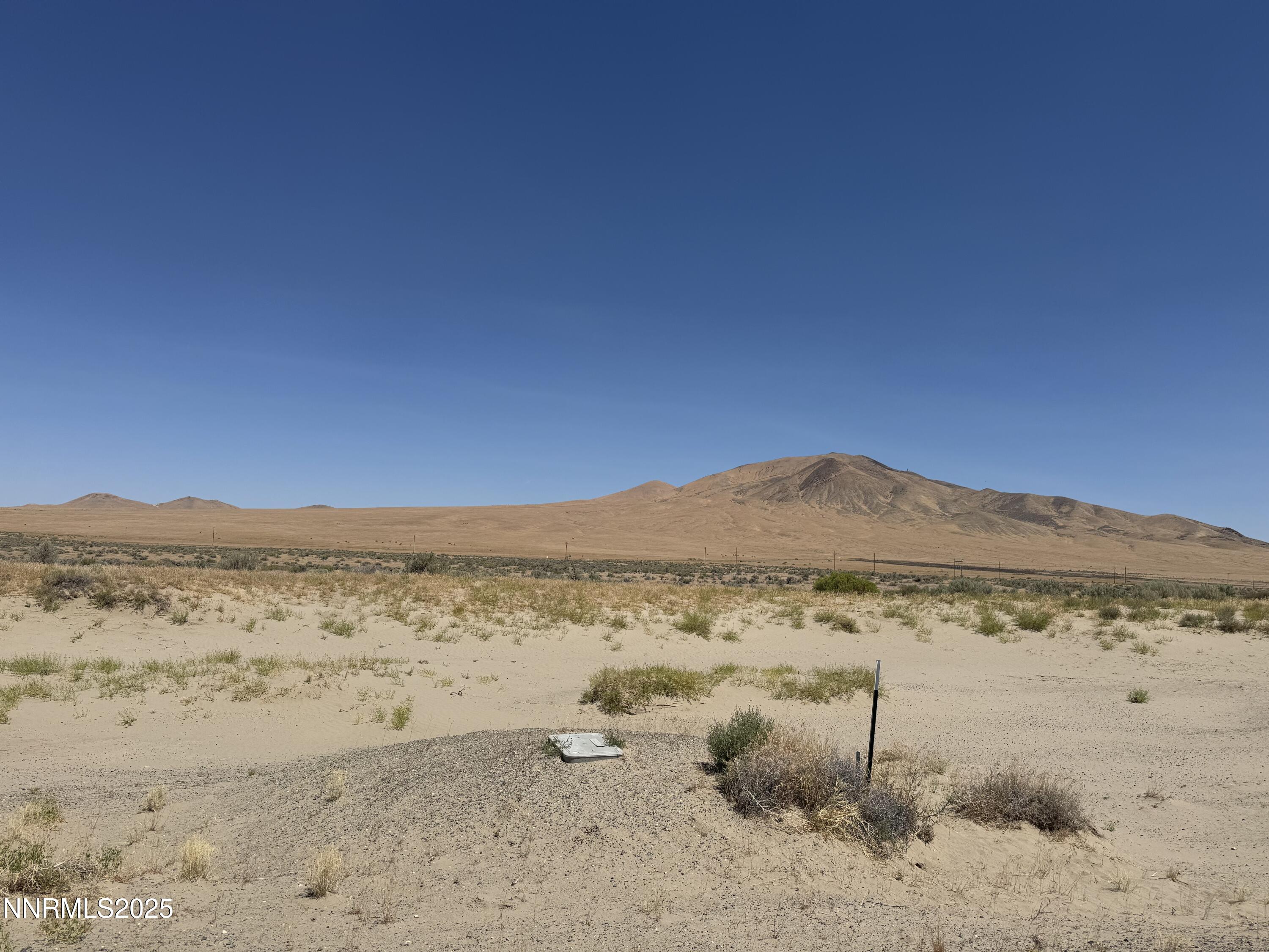 6665 Country Road, Unit 18 Winnemucca, NV 89445 - Photo 5 of 5 a view of lake with mountain