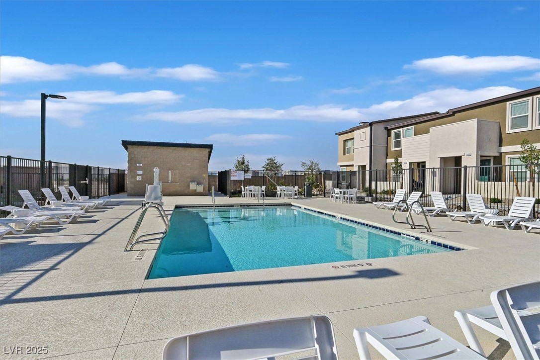 1906 Arietta Vista Street Henderson, NV 89044 - Photo 2 of 25 Community pool with a patio area
