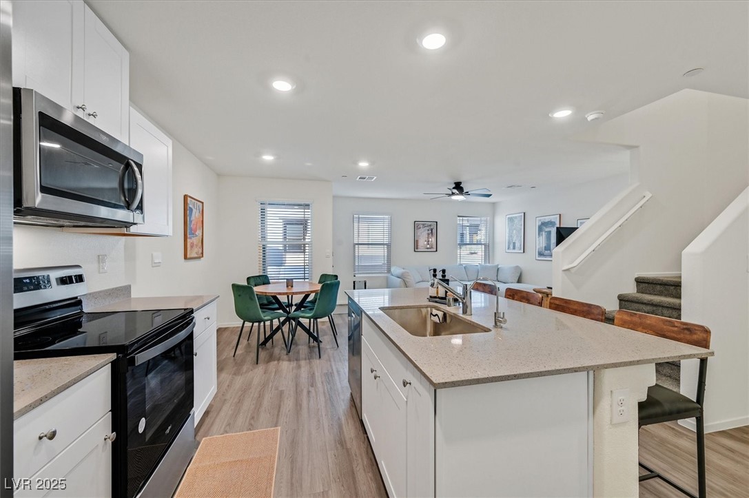1906 Arietta Vista Street Henderson, NV 89044 - Photo 9 of 25 Kitchen with appliances with stainless steel finis