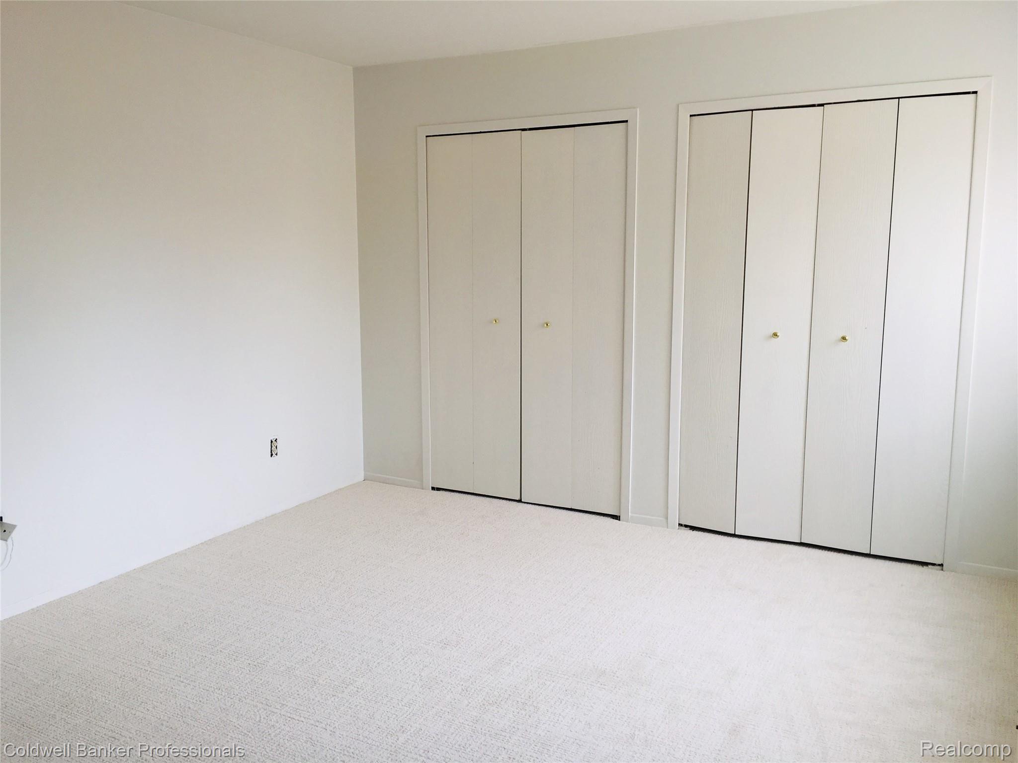676 Tennyson, Unit 13 Rochester, MI 48307 - Photo 9 of 22 Master with 2 closets