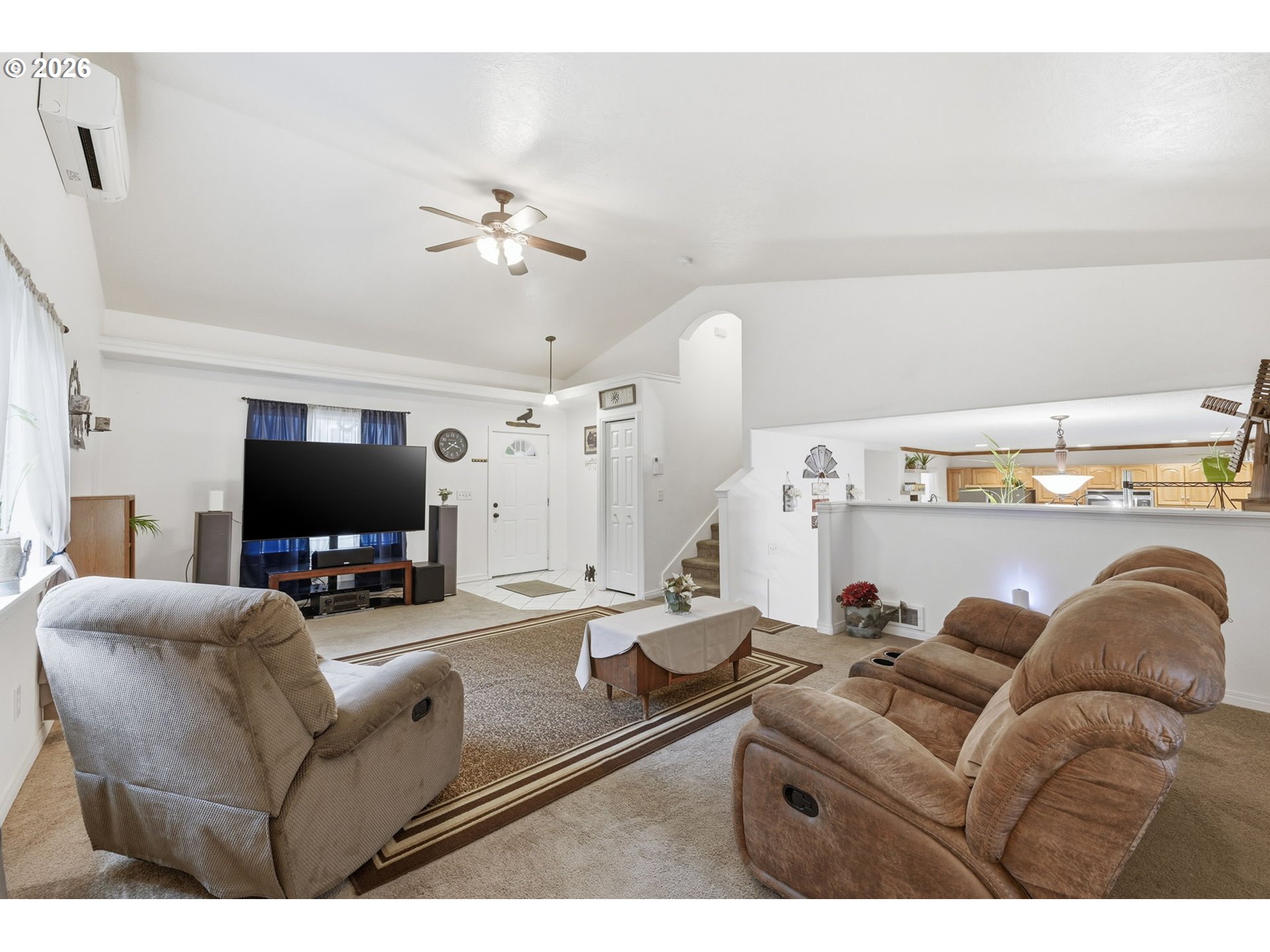 6842 Jessica Drive Springfield, OR 97478 - Photo 34 of 34 a living room with furniture and a flat screen tv