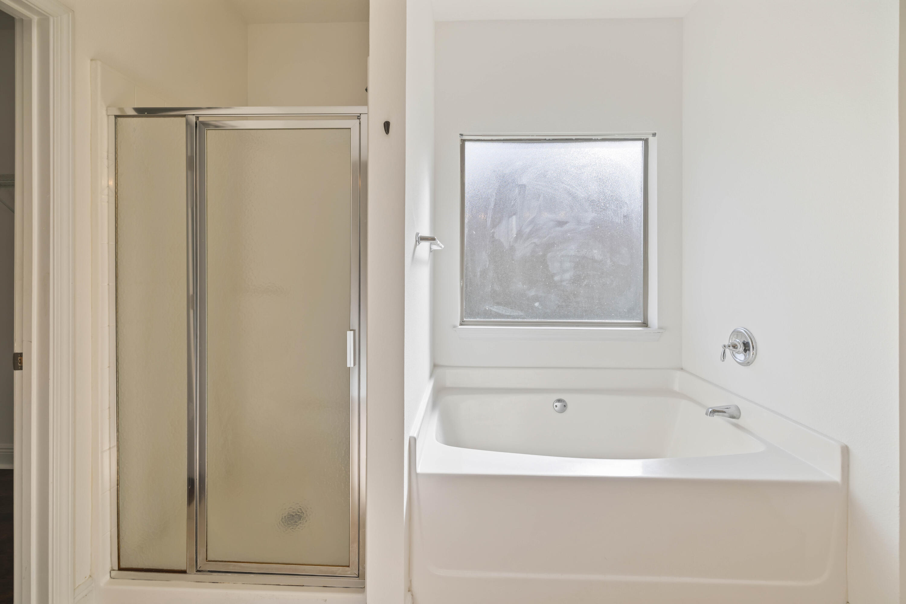 337 Mango Lane Freeport, FL 32439 - Photo 12 of 35 a white bath tub sitting next to a shower