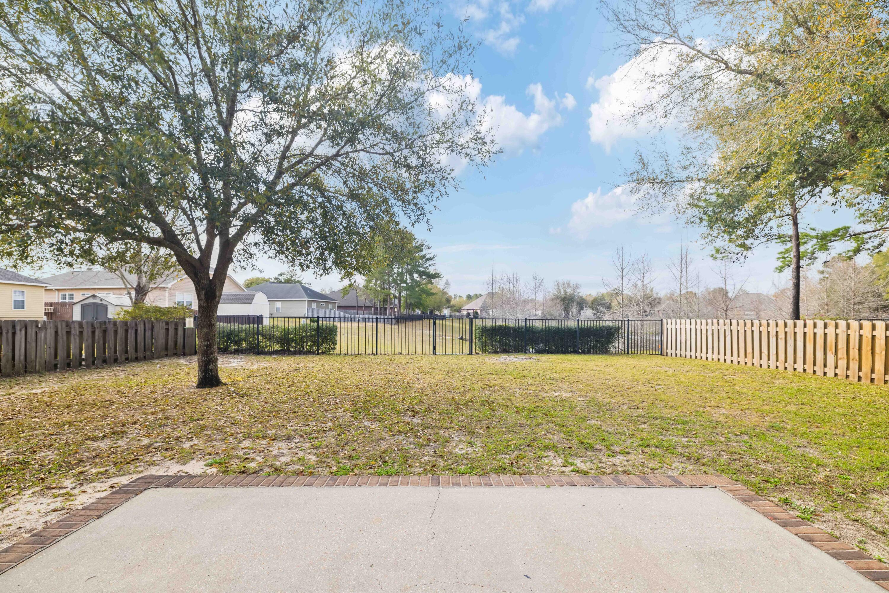337 Mango Lane Freeport, FL 32439 - Photo 27 of 35 a view of an outdoor space and a yard