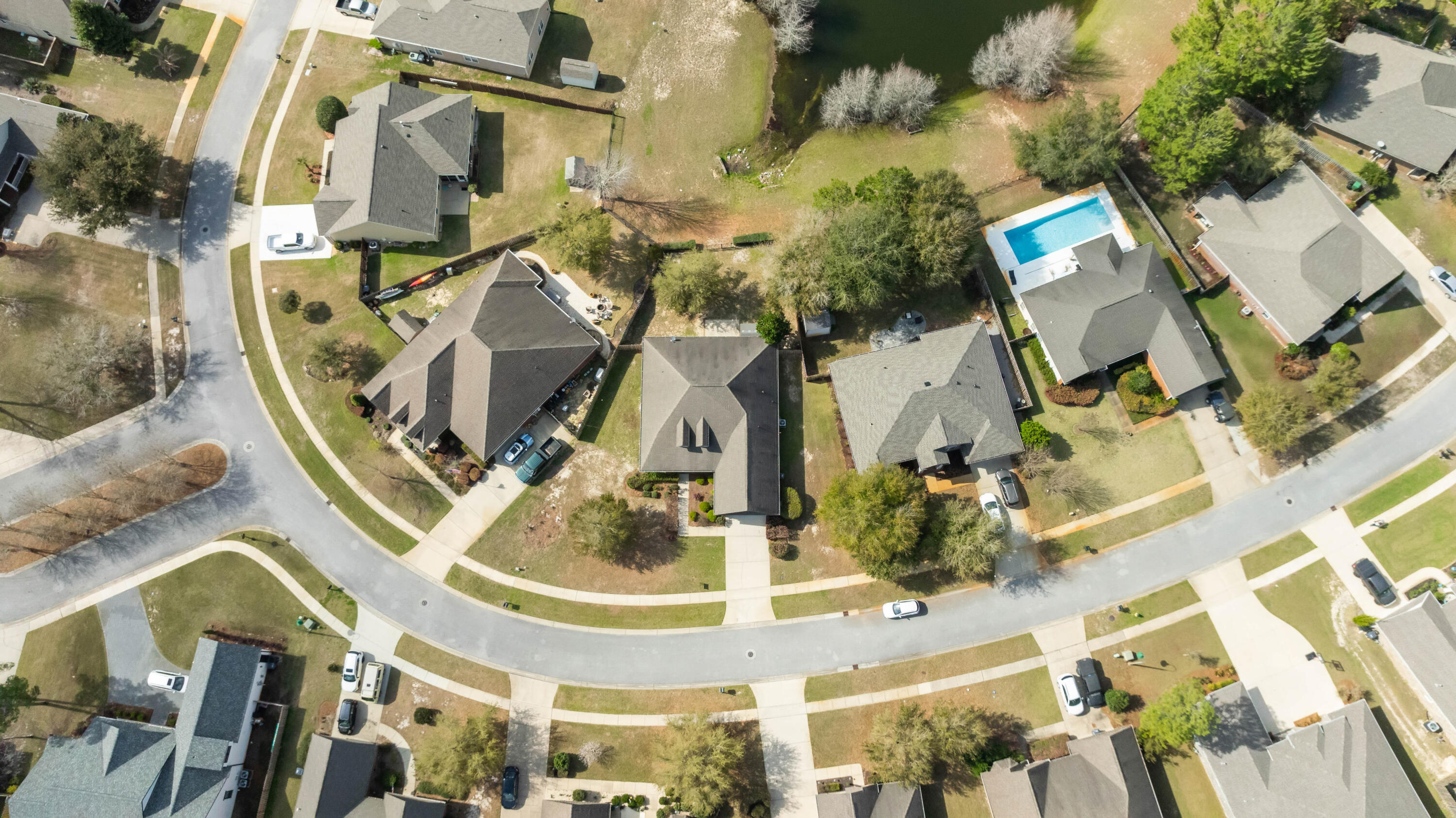 337 Mango Lane Freeport, FL 32439 - Photo 32 of 35 an aerial view of residential houses with outdoor space and parking