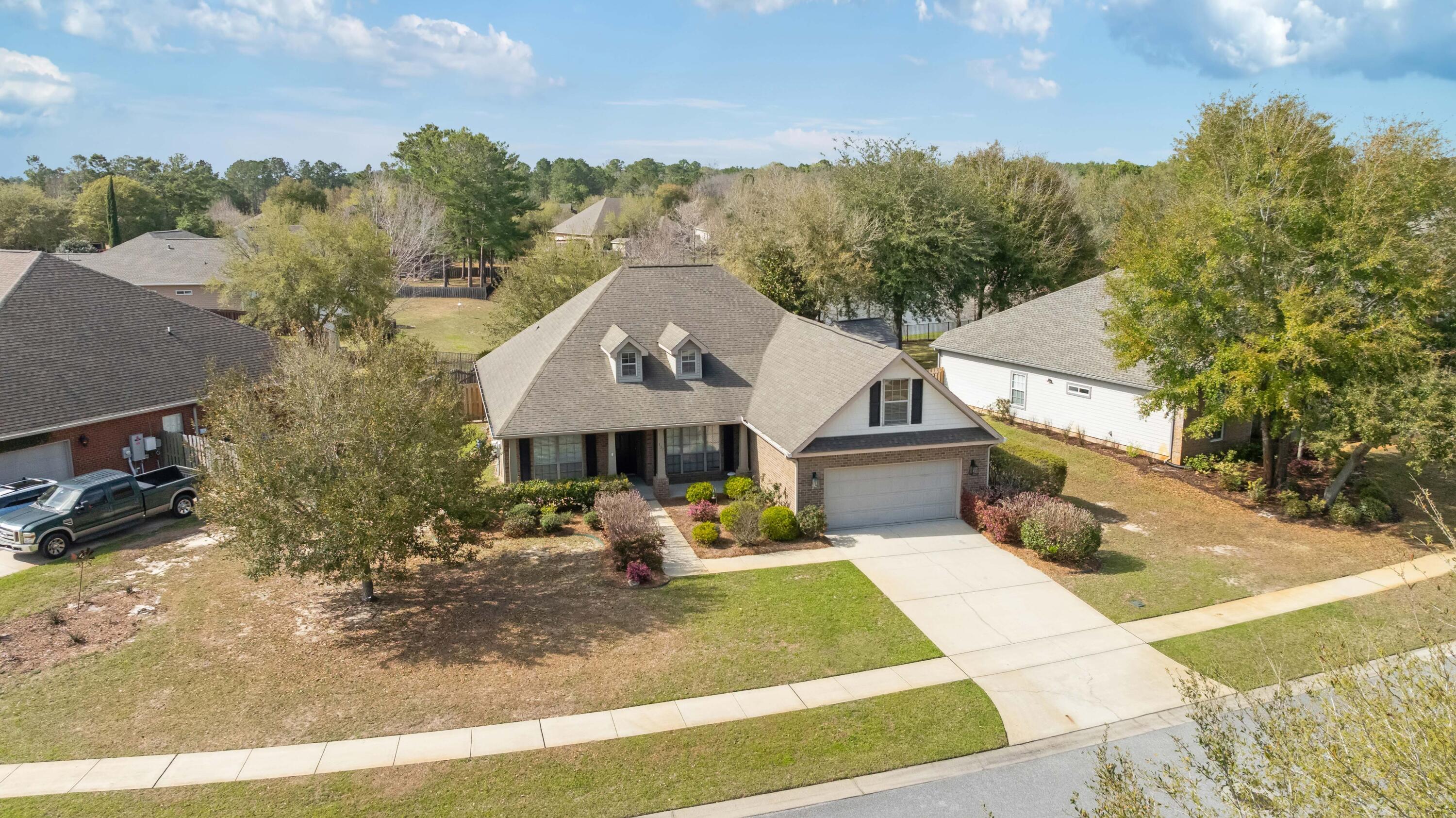 337 Mango Lane Freeport, FL 32439 - Photo 35 of 35 a front view of a house with garden