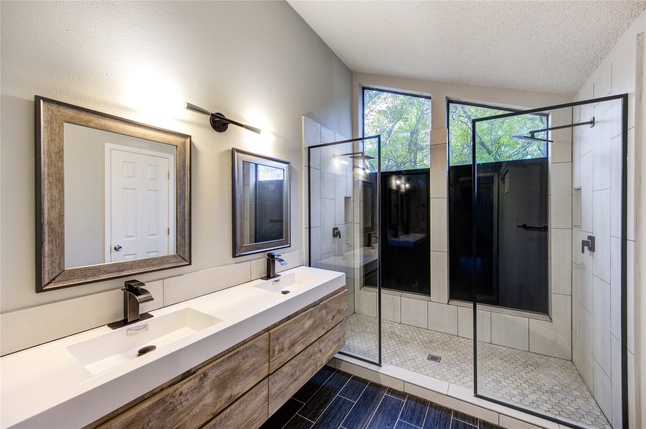 530 Enchanted Lane Spring, TX 77388 - Photo 20 of 26 a bathroom with double vanity and a mirror