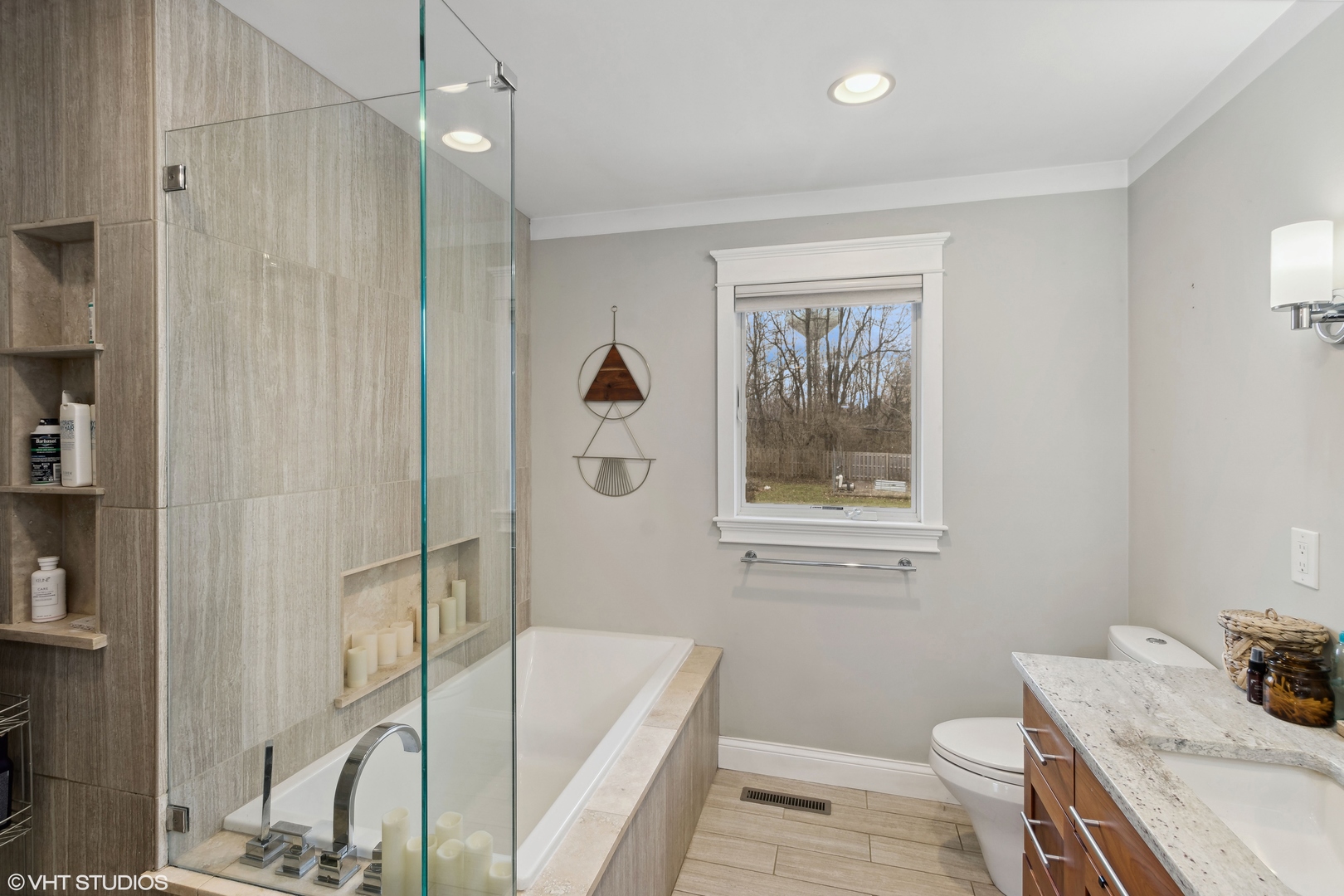 712 Surrey Lane Algonquin, IL 60102 - Photo 11 of 19 a bathroom with a bathtub and a shower
