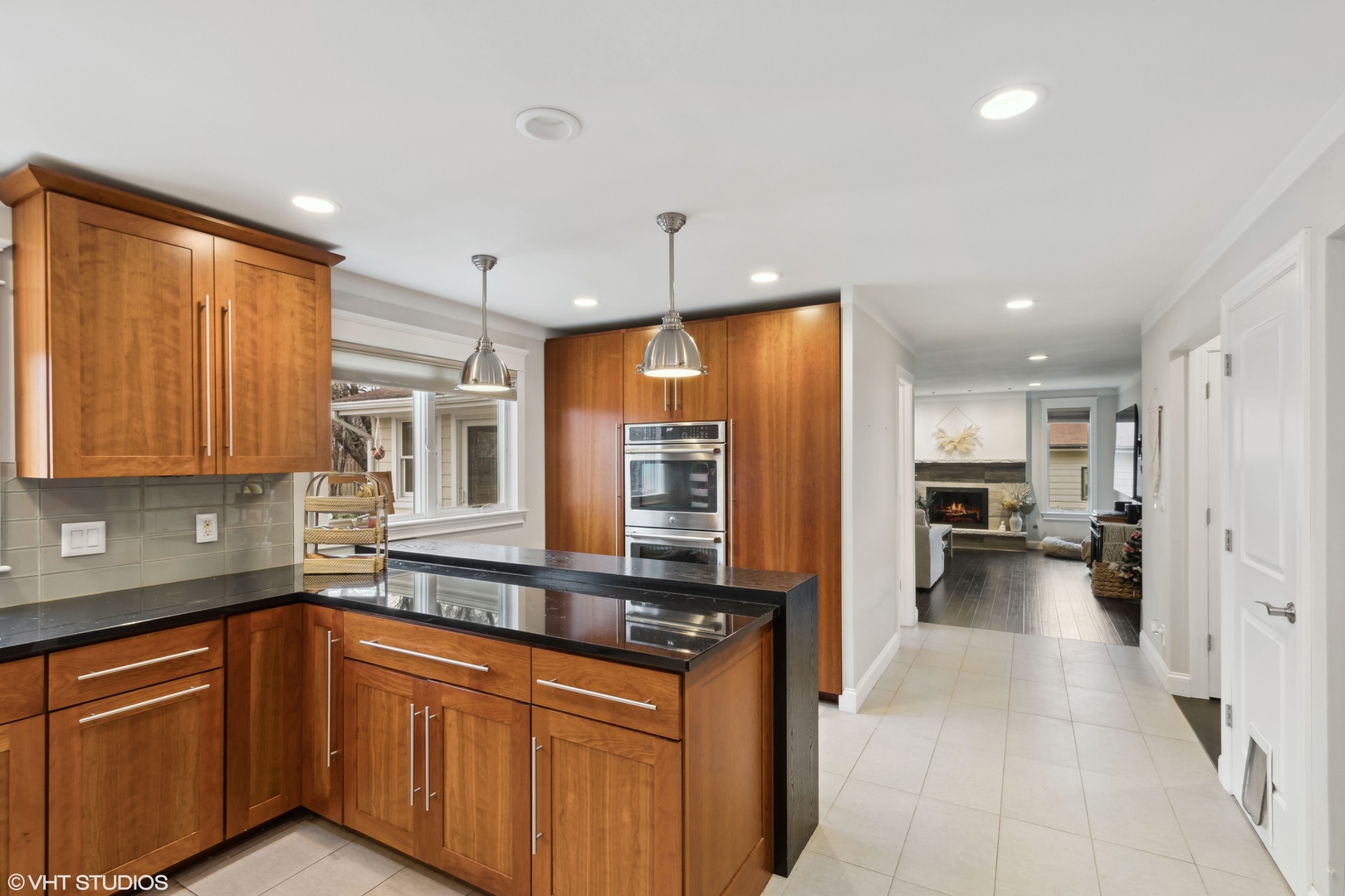 712 Surrey Lane Algonquin, IL 60102 - Photo 5 of 19 a kitchen with stainless steel appliances granite countertop a refrigerator and a sink
