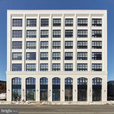 a view of a building and a street light