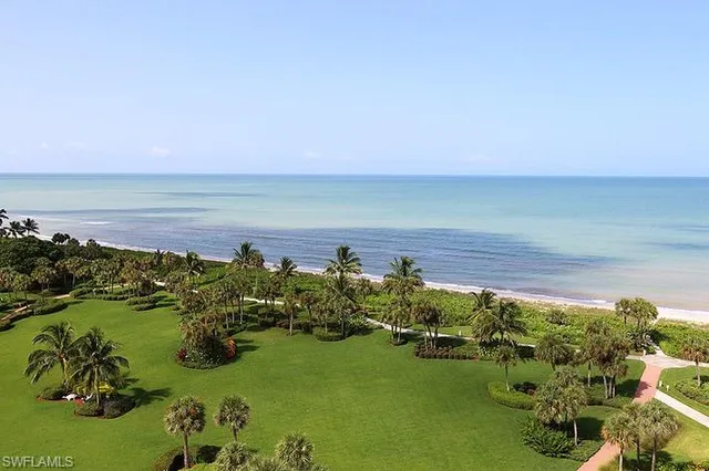 a view of a lake with a yard