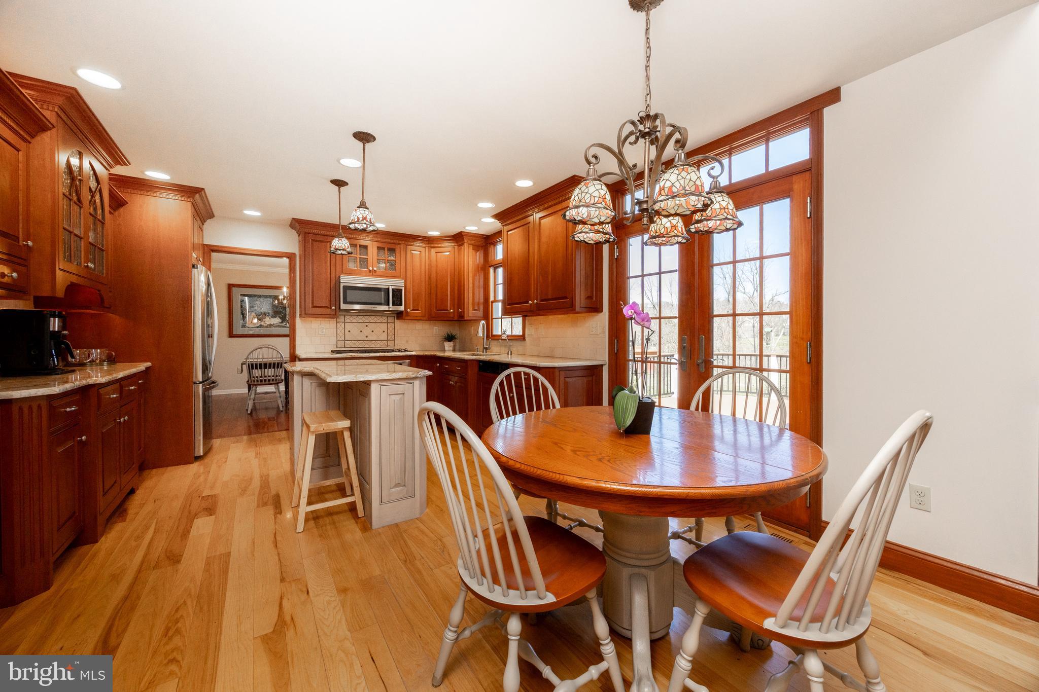 21 Krauser Road Downingtown, PA 19335 - Photo 13 of 54 a view of a dining room with furniture window and wooden floor