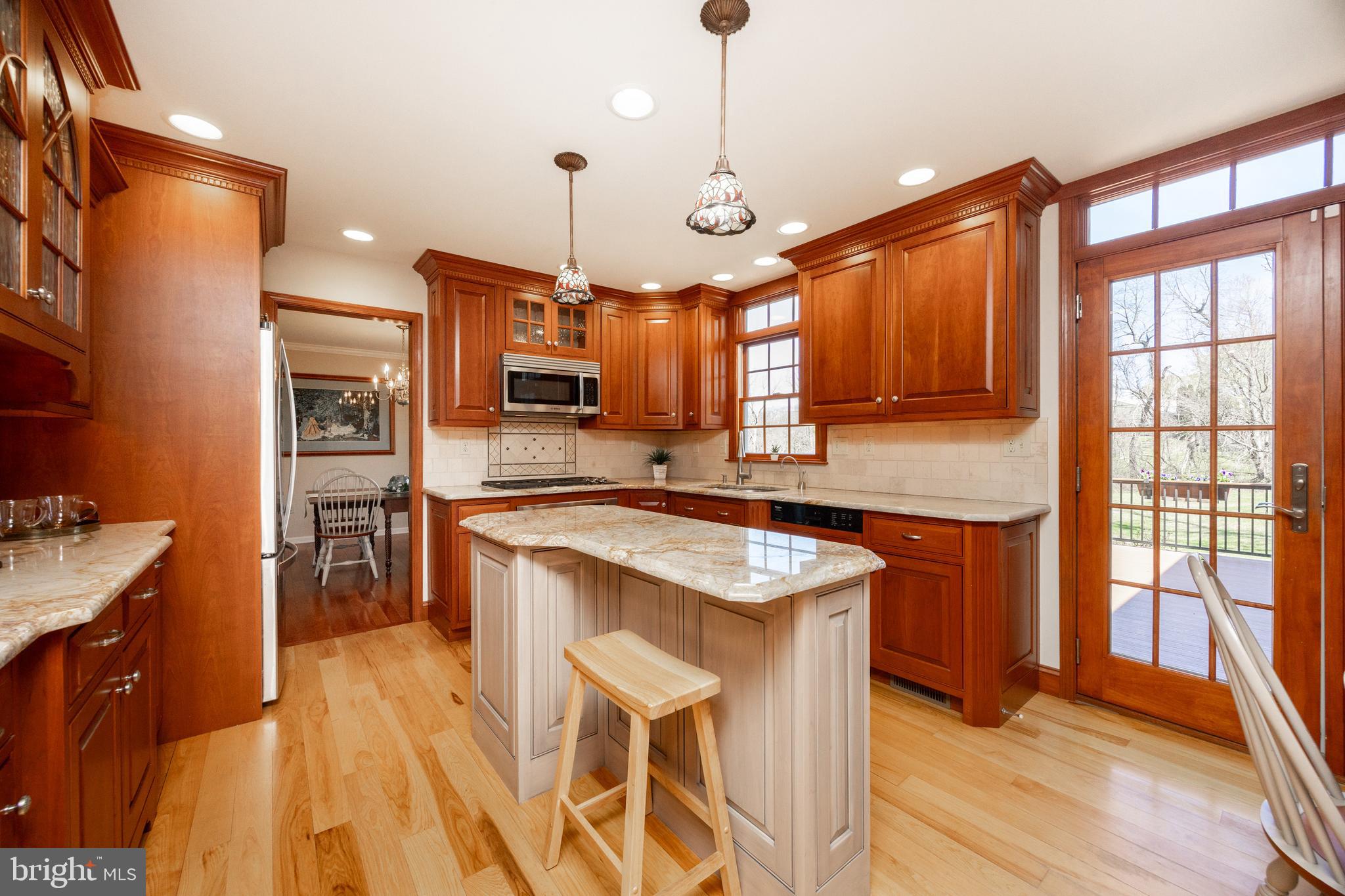 21 Krauser Road Downingtown, PA 19335 - Photo 15 of 54 a kitchen with stainless steel appliances granite countertop a sink stove and refrigerator