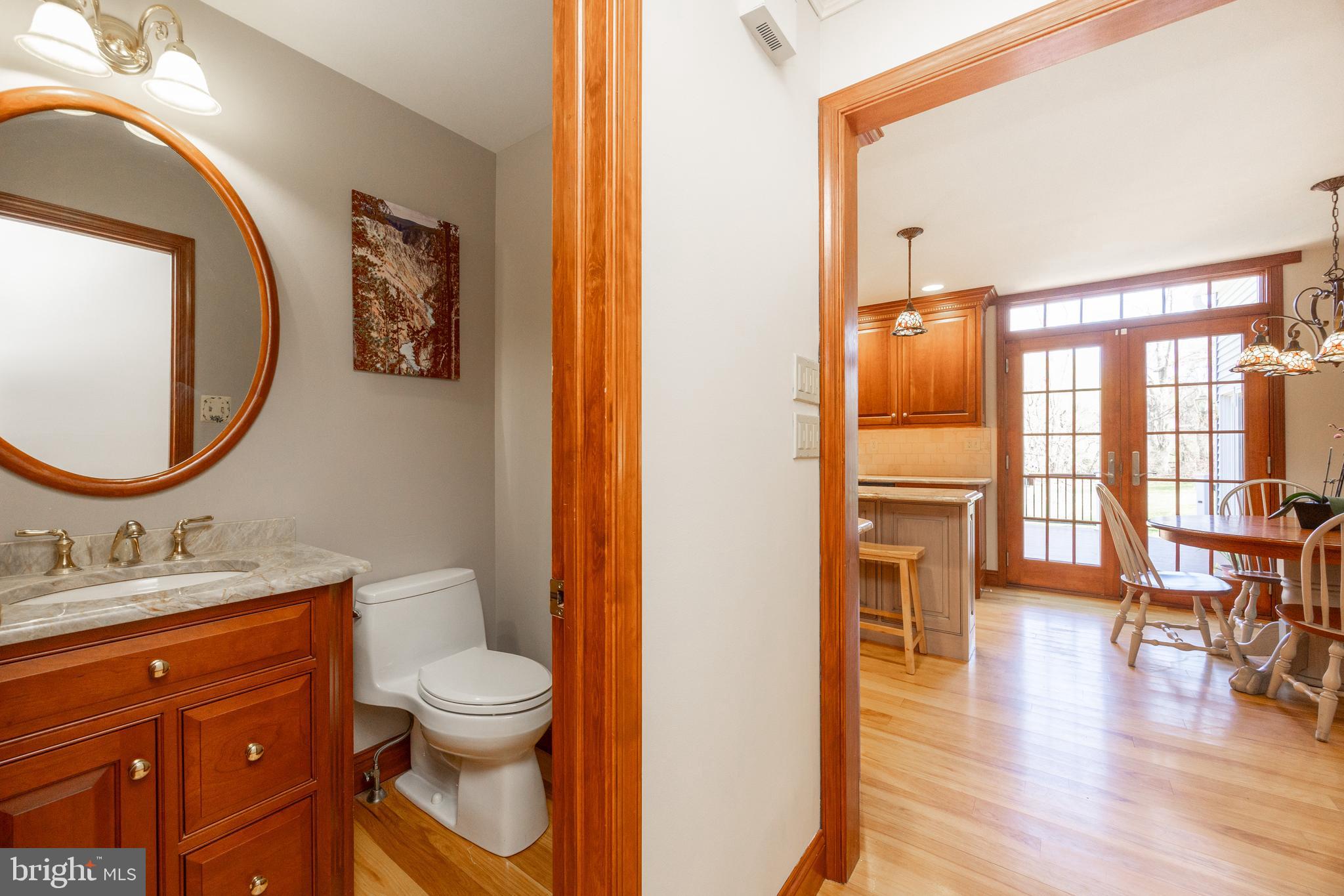 21 Krauser Road Downingtown, PA 19335 - Photo 19 of 54 a bathroom with a toilet a sink and a mirror