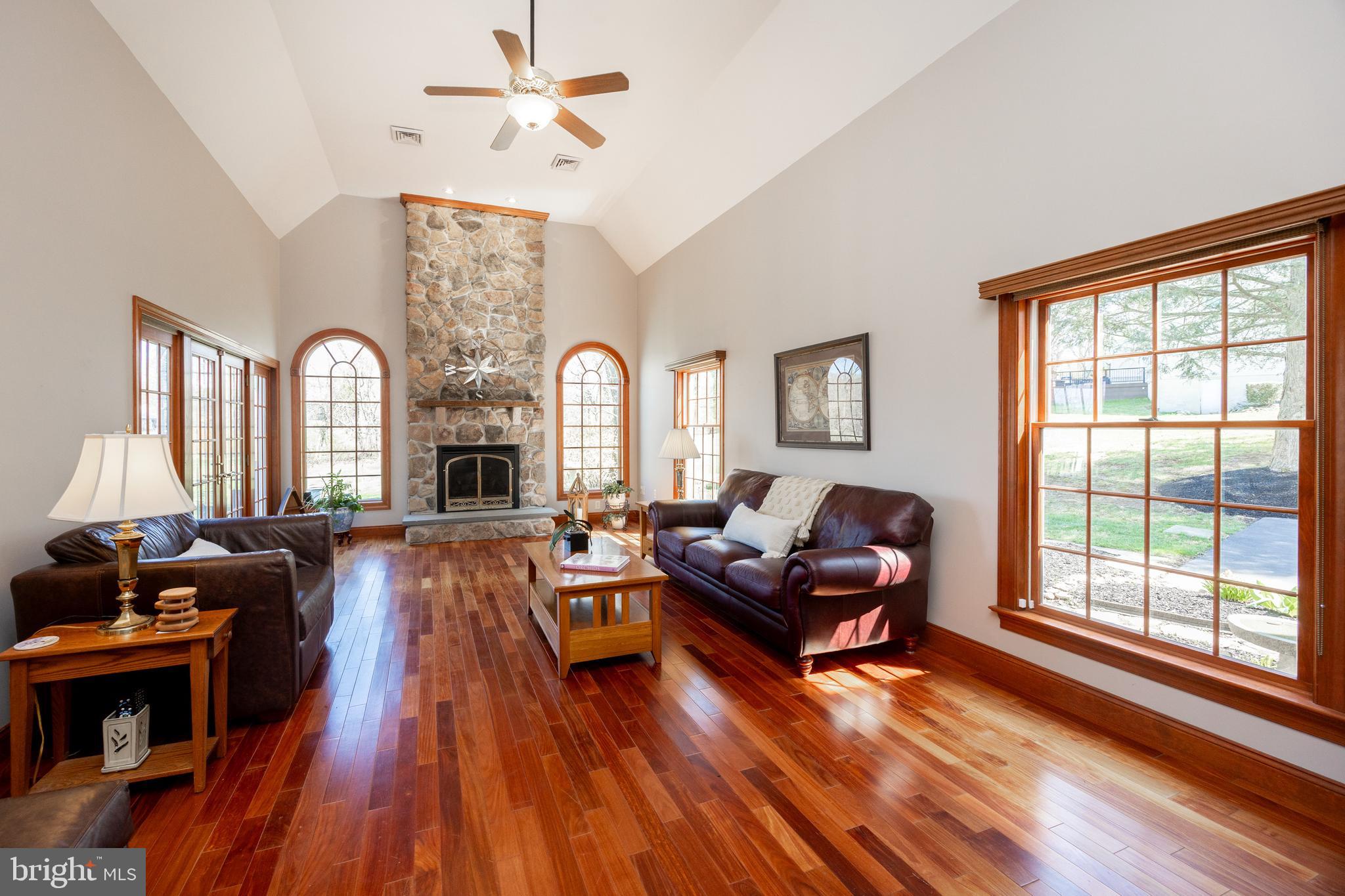 21 Krauser Road Downingtown, PA 19335 - Photo 20 of 54 a living room with furniture fireplace and wooden floor