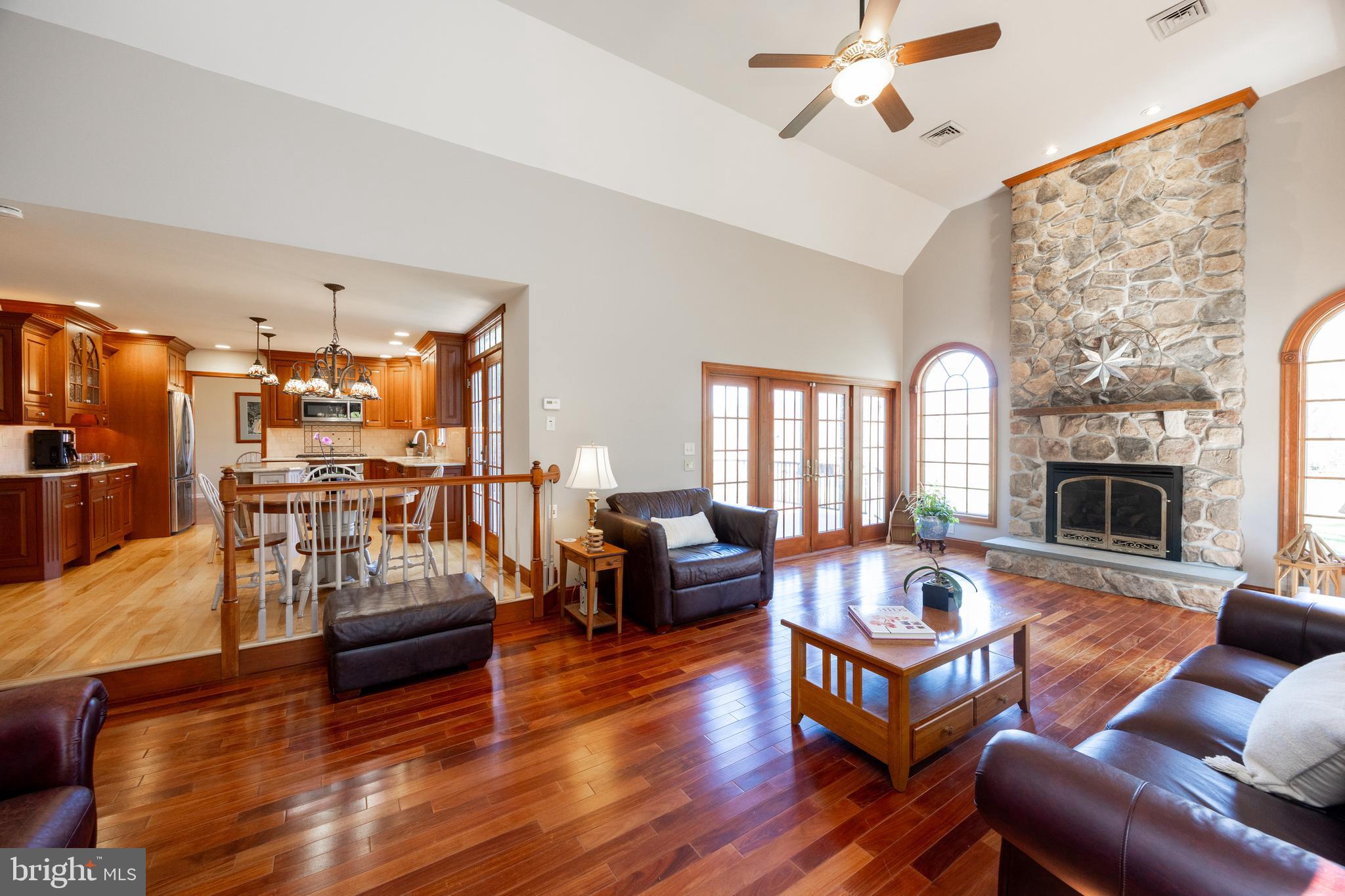 21 Krauser Road Downingtown, PA 19335 - Photo 21 of 54 a living room with fireplace furniture and a wooden floor