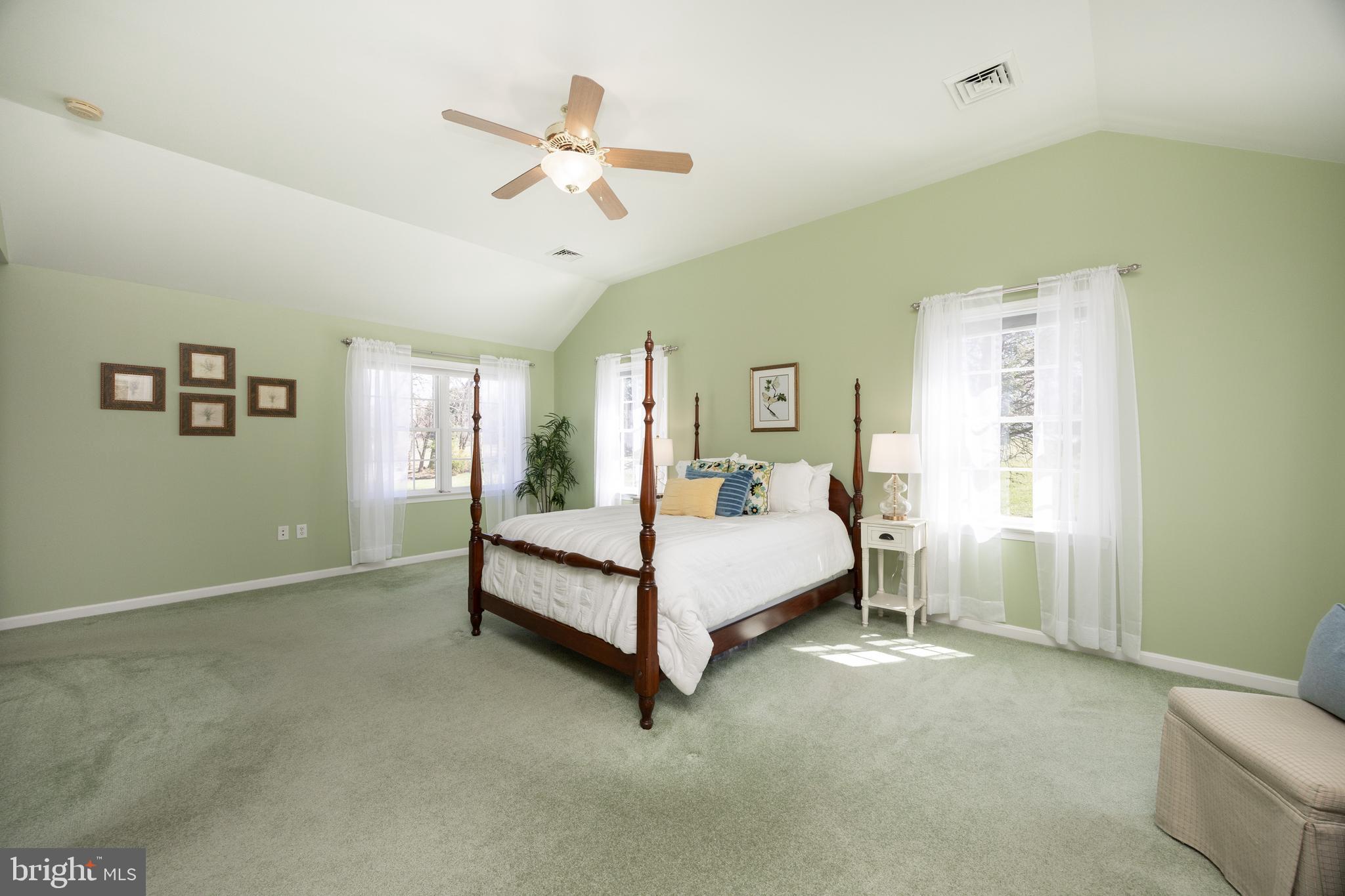 21 Krauser Road Downingtown, PA 19335 - Photo 26 of 54 a bedroom with a bed and a chandelier