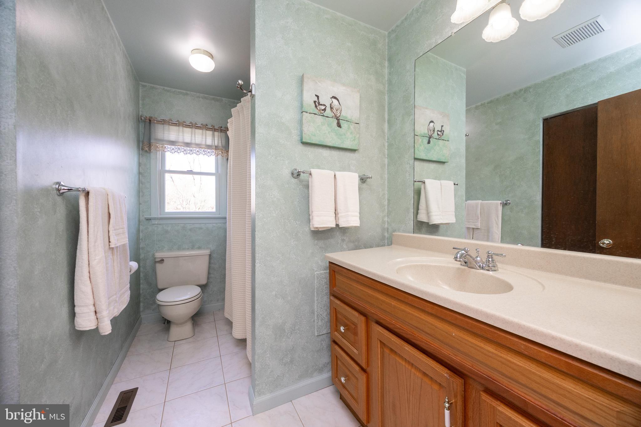 21 Krauser Road Downingtown, PA 19335 - Photo 38 of 54 a bathroom with a granite countertop sink toilet and shower