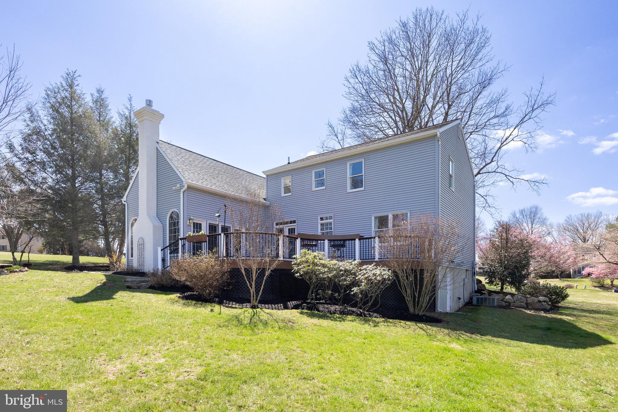 21 Krauser Road Downingtown, PA 19335 - Photo 42 of 54 a view of a house with a yard covered with snow and plants