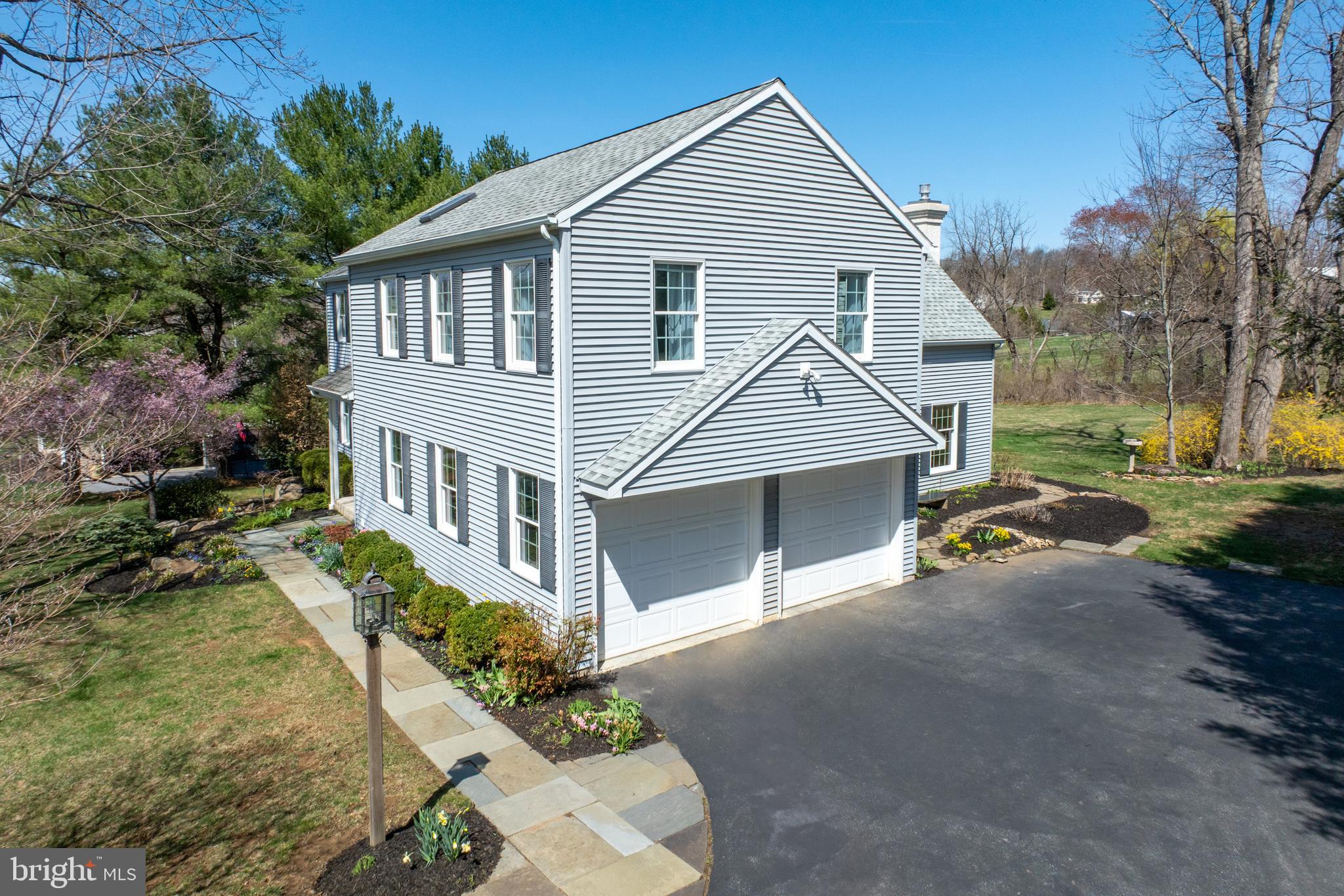 21 Krauser Road Downingtown, PA 19335 - Photo 45 of 54 a view of a white house next to a yard and a yard