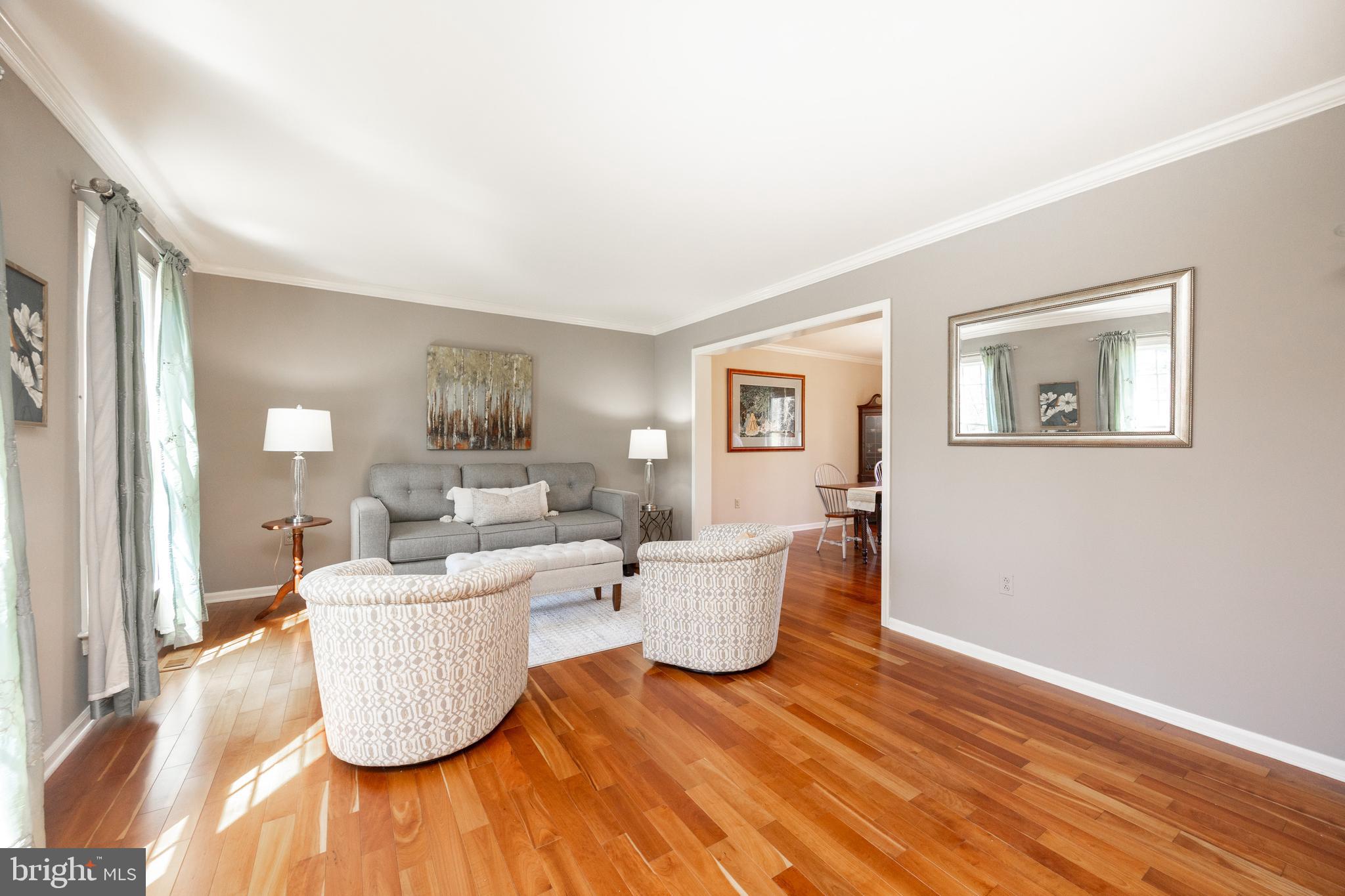 21 Krauser Road Downingtown, PA 19335 - Photo 8 of 54 a living room with furniture and a wooden floor