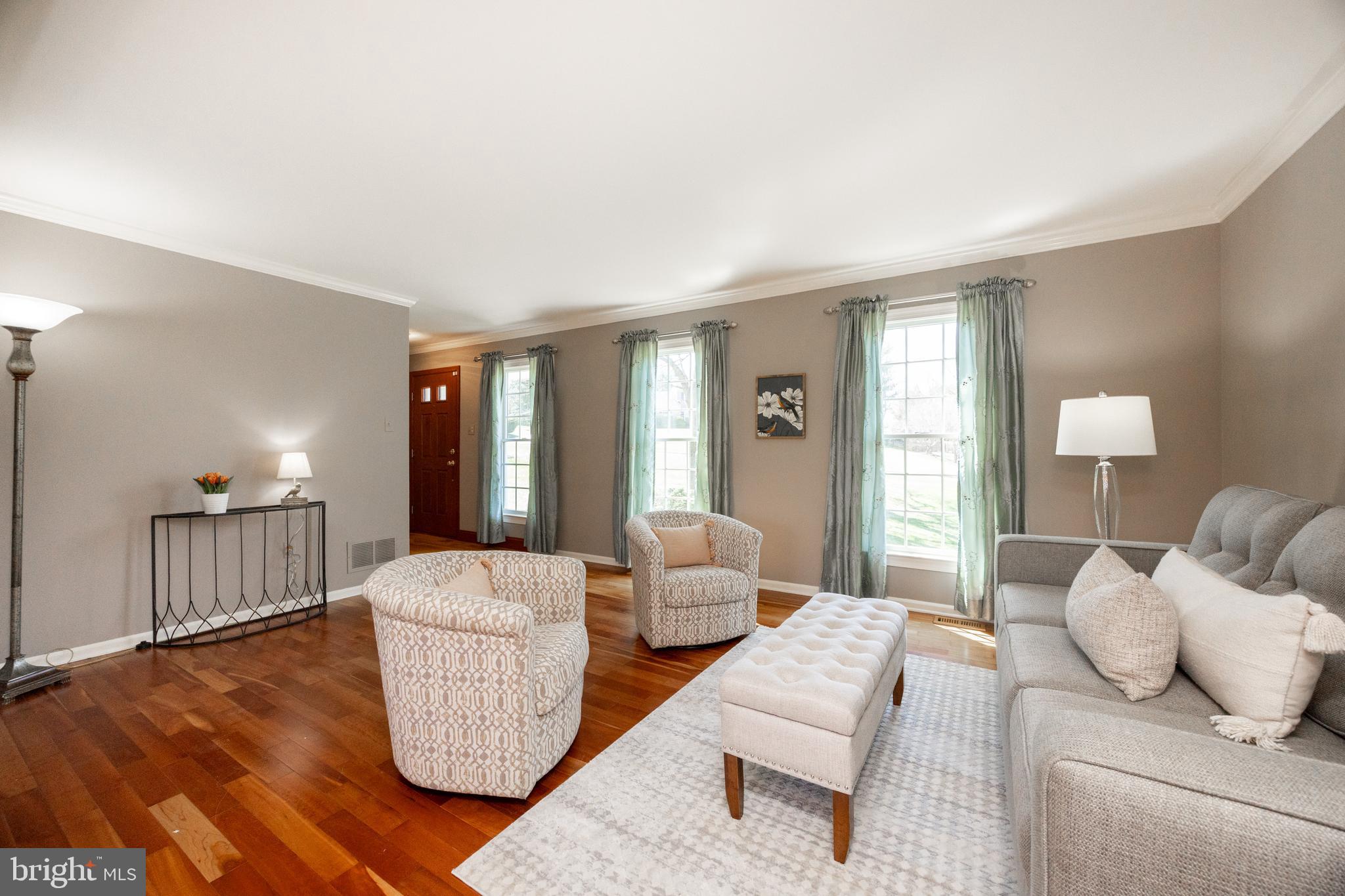 21 Krauser Road Downingtown, PA 19335 - Photo 9 of 54 a living room with furniture and a wooden floor